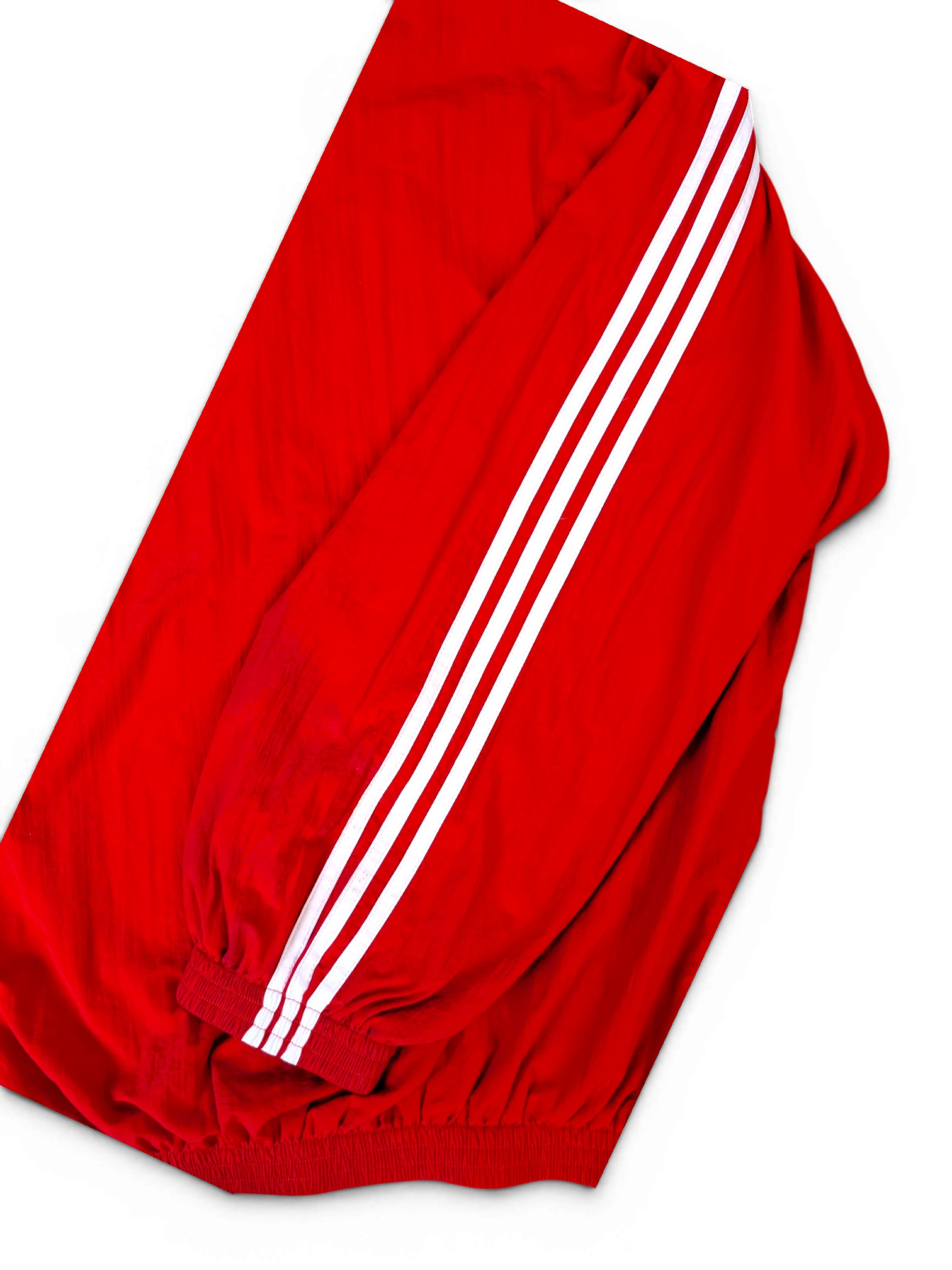 JAKE & IPI Balenciaga x Adidas red track jacket sleeve with signature white three-stripe detailing