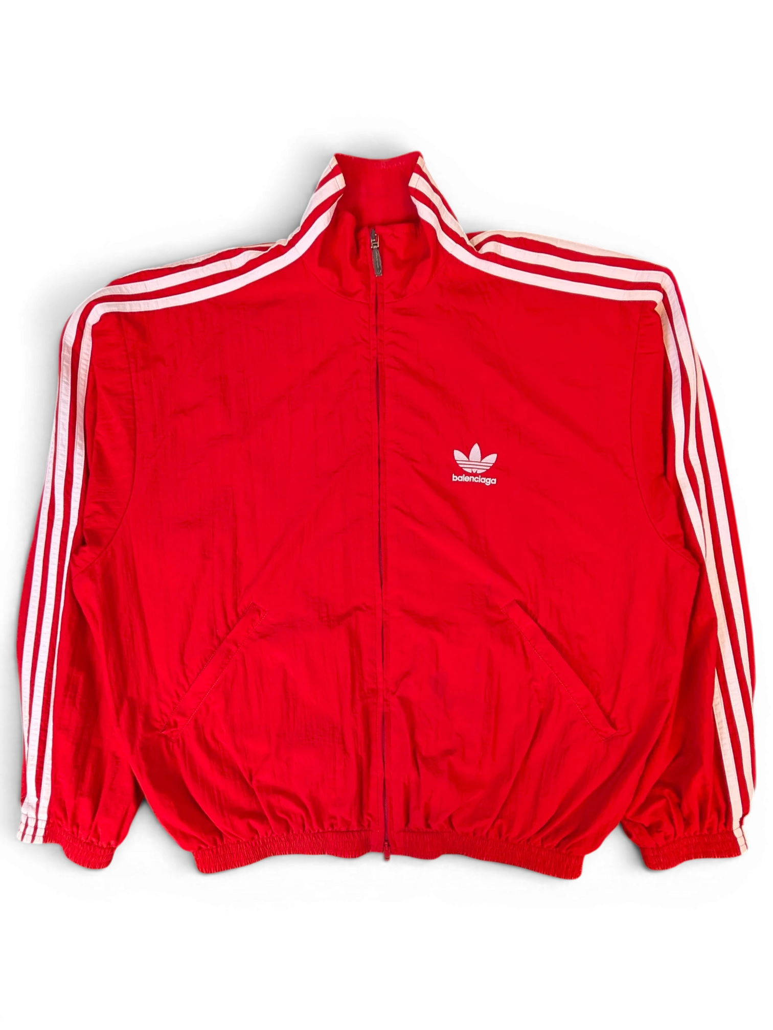 JAKE & IPI Balenciaga x Adidas red track jacket with white three-stripe detailing and embroidered logo