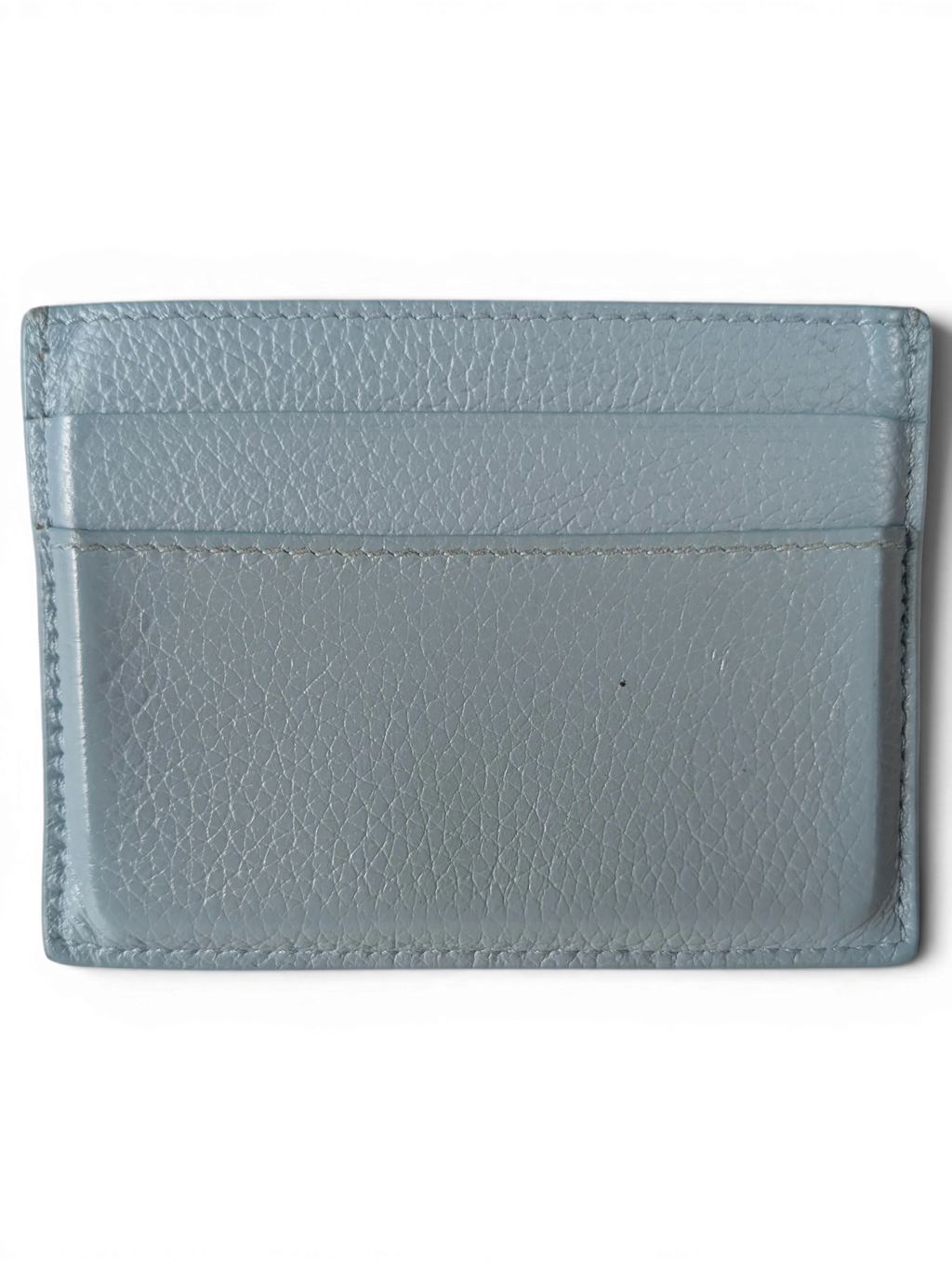 JAKE & IPI light blue grained leather Balenciaga card holder with minimalist design and visible stitching.