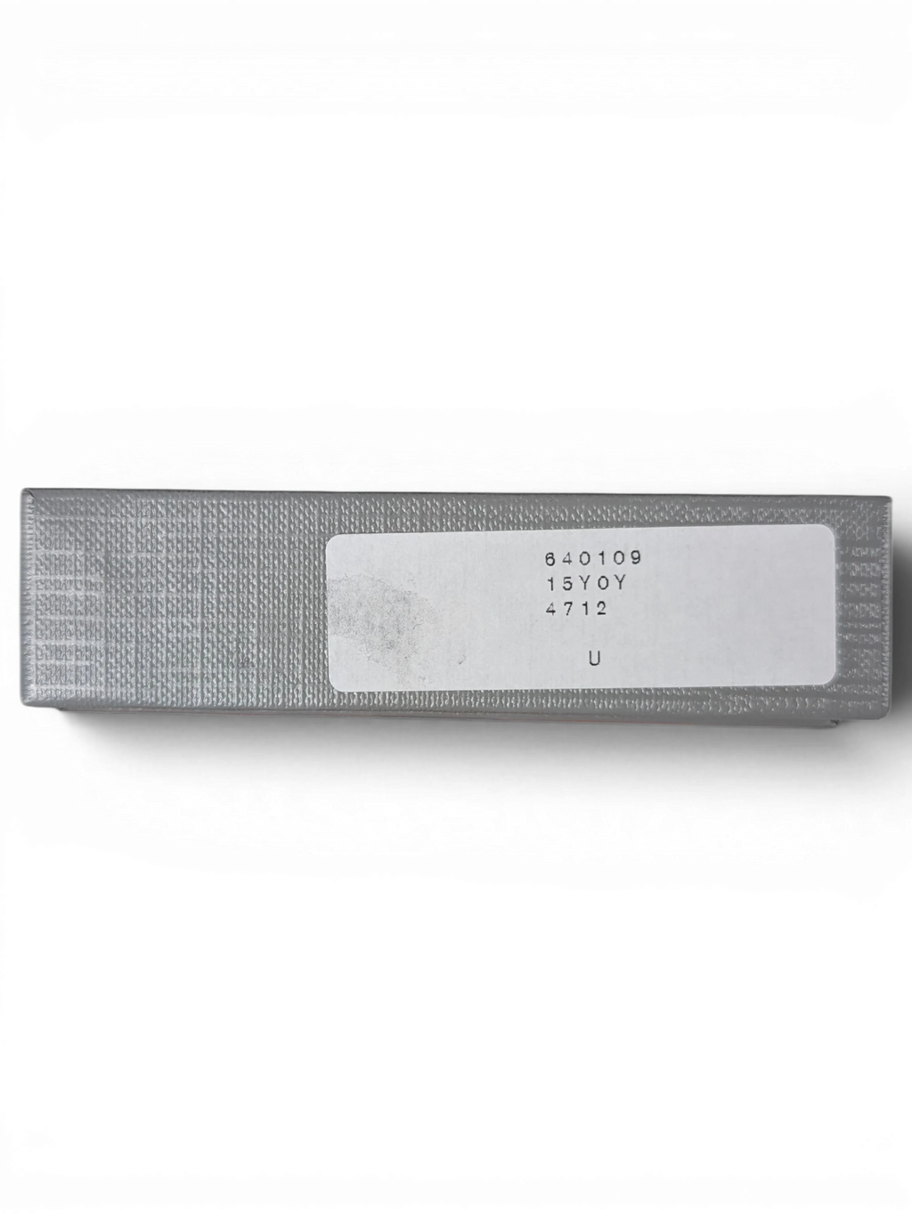 JAKE & IPI Balenciaga card holder grey textured box with product label held in hand