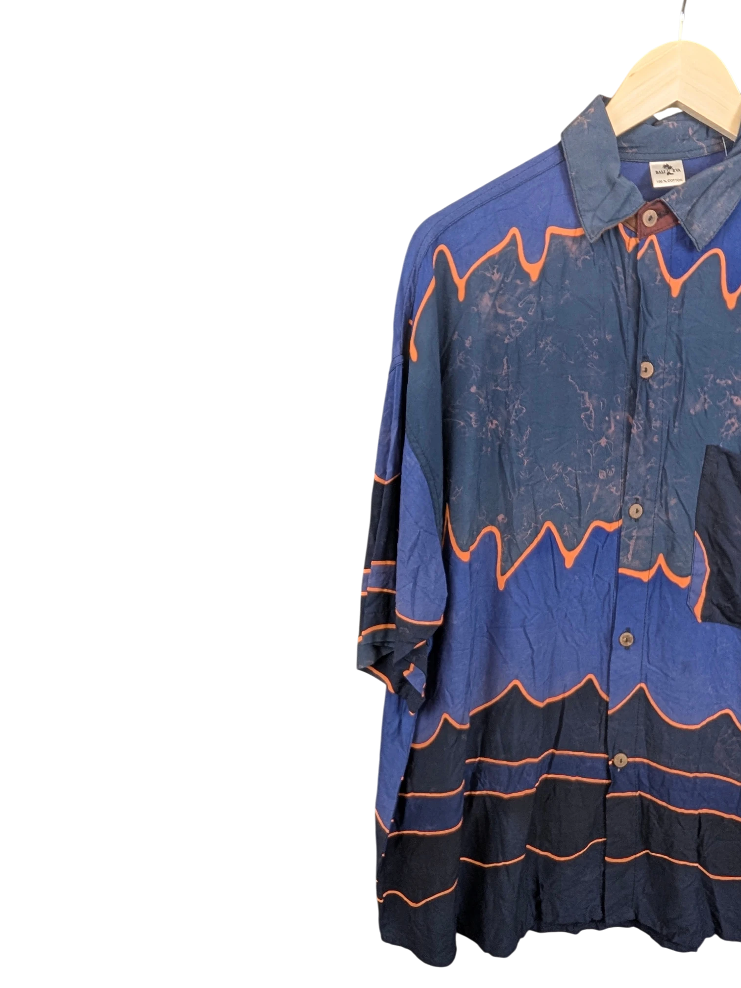 JAKE & IPI Bali Eva Hawaiian shirt in navy blue with orange wave patterns and a button-down collar