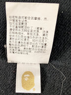 JAKE & IPI Bape Shark hoodie care instruction label with gold ape head logo tag