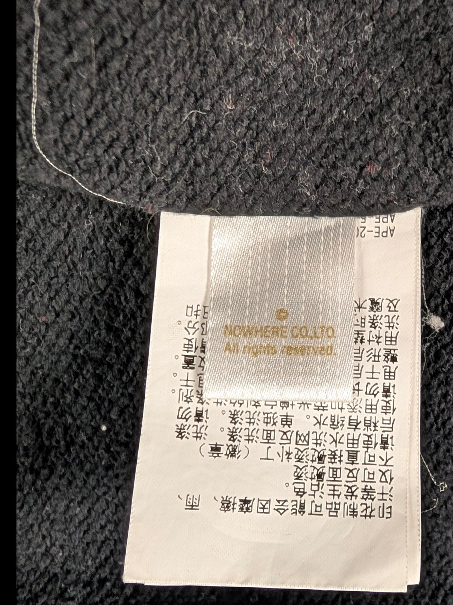 JAKE & IPI IBE Bape Shark hoodie black fabric care label with Japanese text and branding details