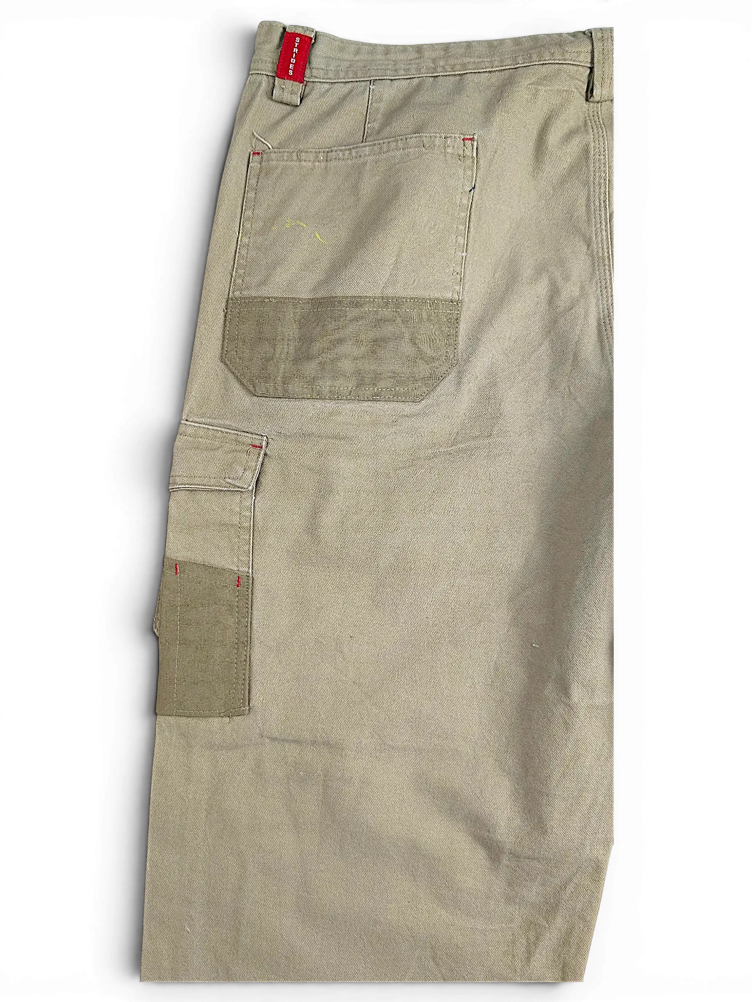 JAKE & IPI Bad Get It On olive green double-knee workwear pants with contrast pocket detailing and red stitching accents