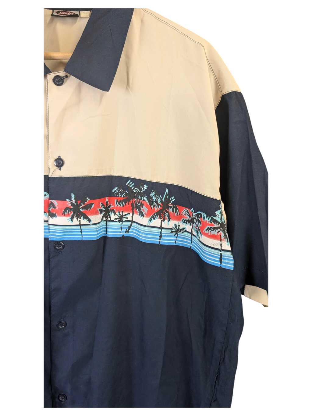 JAKE & IPI beige and navy blue Hawaiian shirt featuring a tropical palm tree print and button-down front.