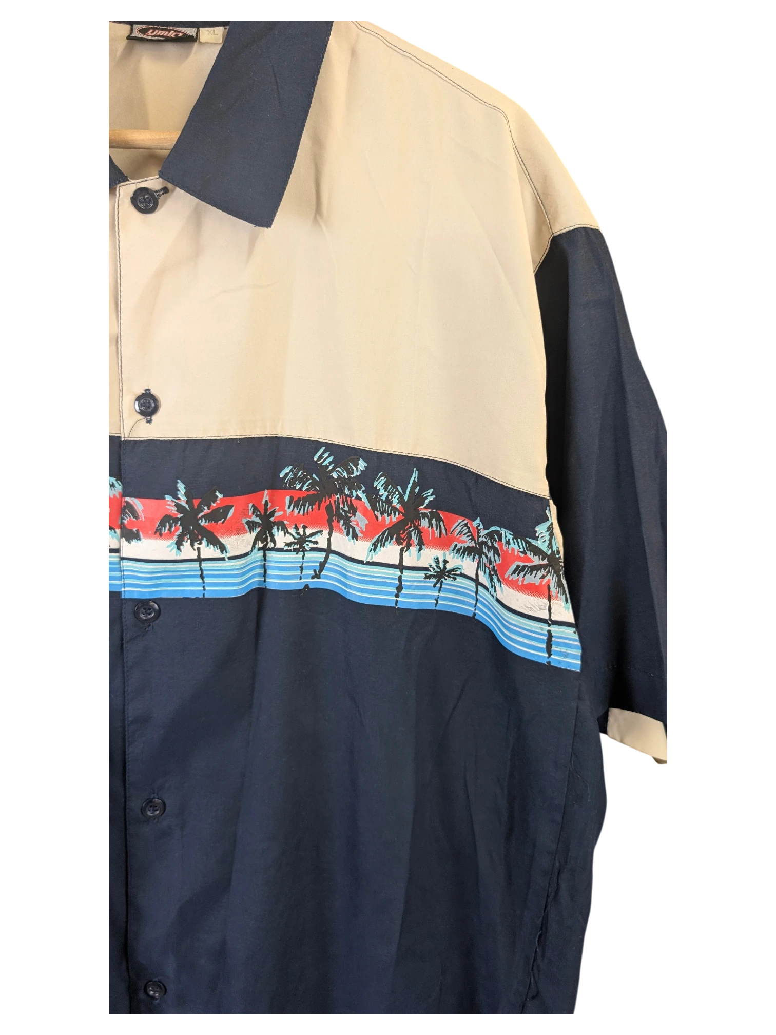 JAKE & IPI beige and navy blue Hawaiian shirt featuring a tropical palm tree print and button-down front.
