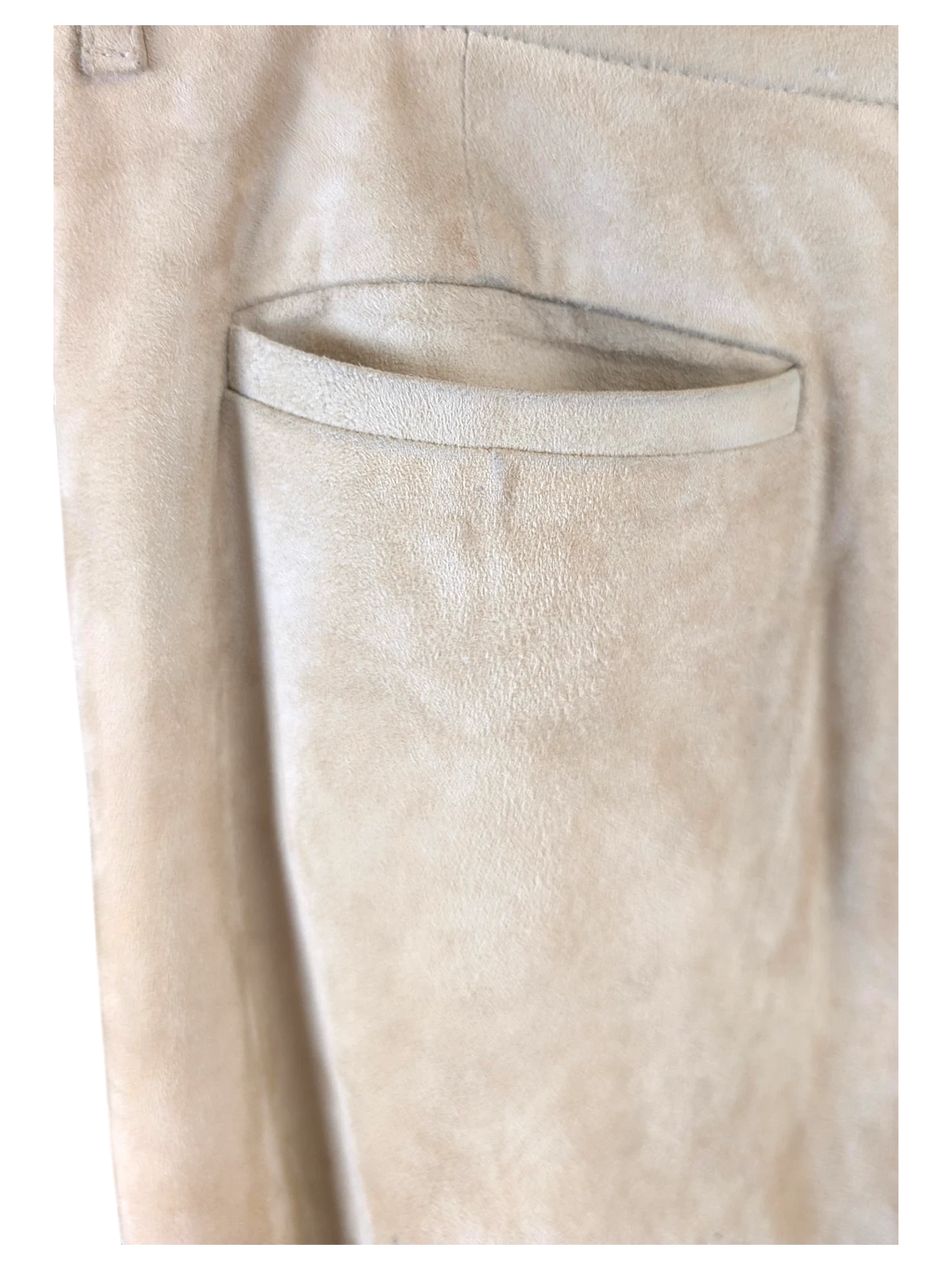 JAKE & IPI beige suede leather pants featuring a clean welt pocket detail on a hanger.