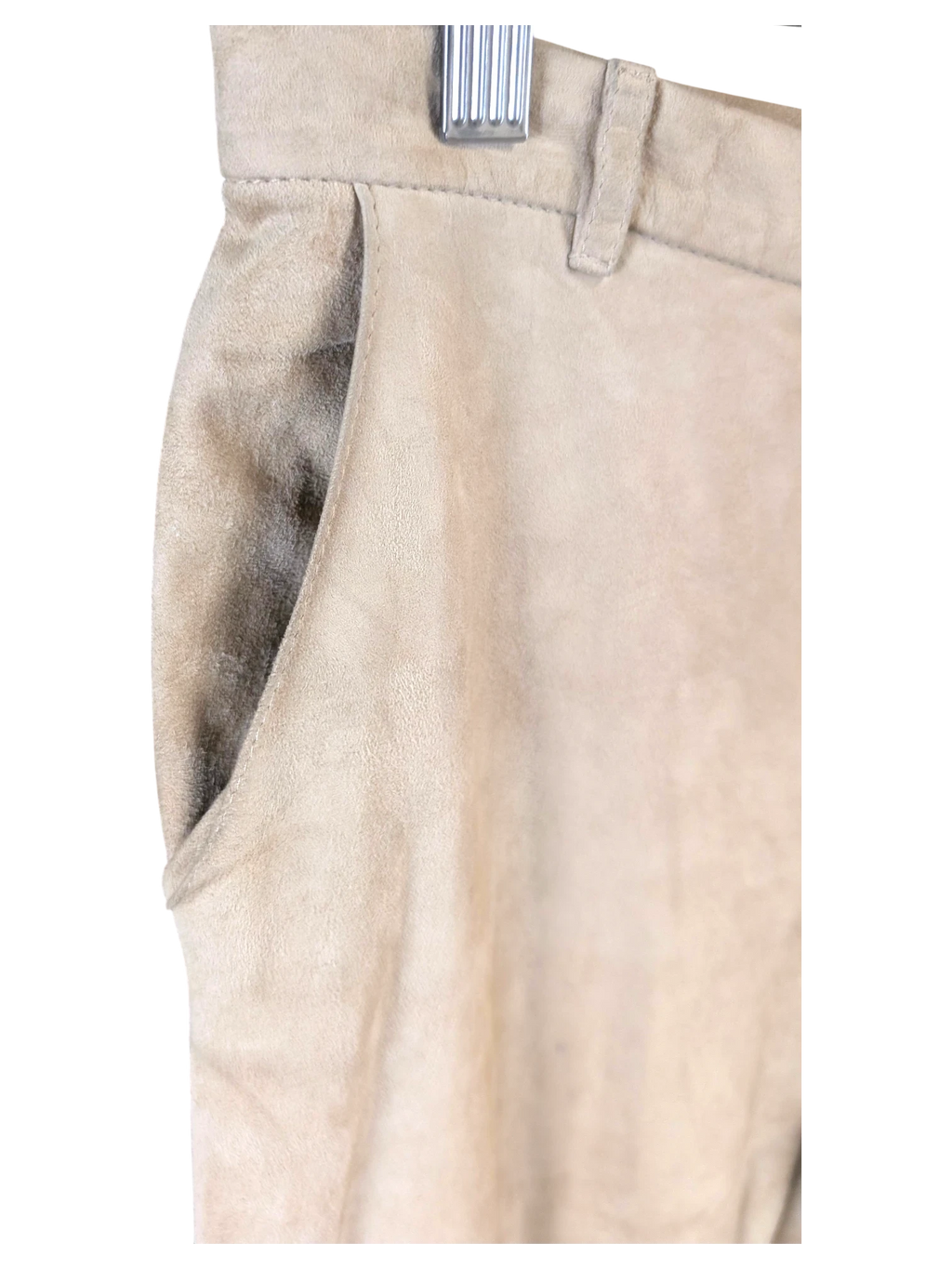 JAKE & IPI beige suede leather pants featuring a side pocket and belt loops, hanging on a metal hanger.