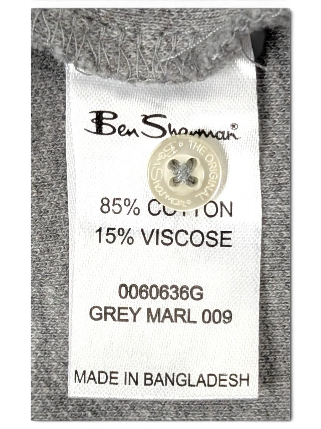 JAKE & IPI Ben Sherman grey marl polo shirt care label showing 85 percent cotton and 15 percent viscose composition
