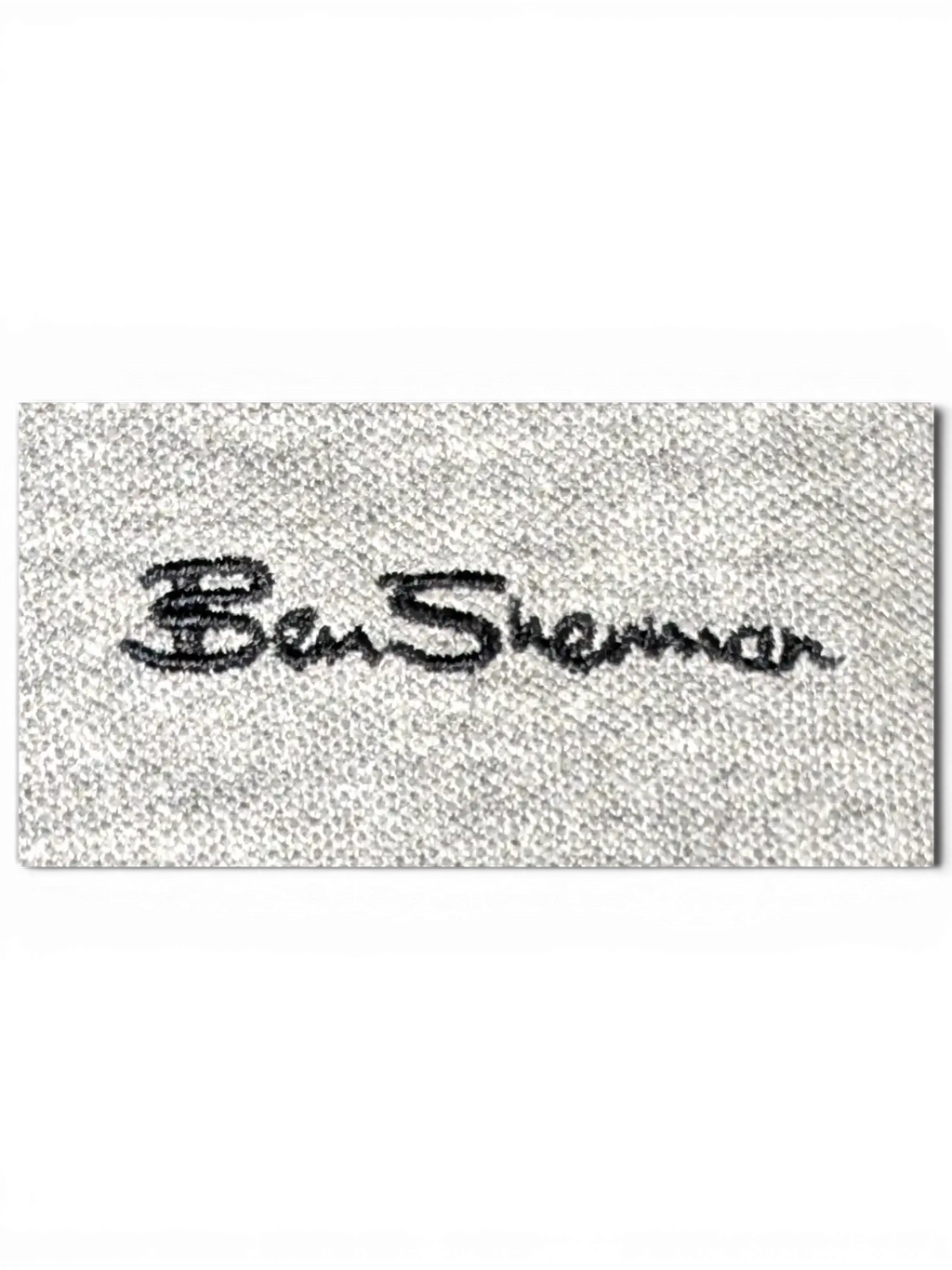 JAKE & IPI Ben Sherman grey polo shirt featuring a black embroidered chest logo and classic pique cotton texture.