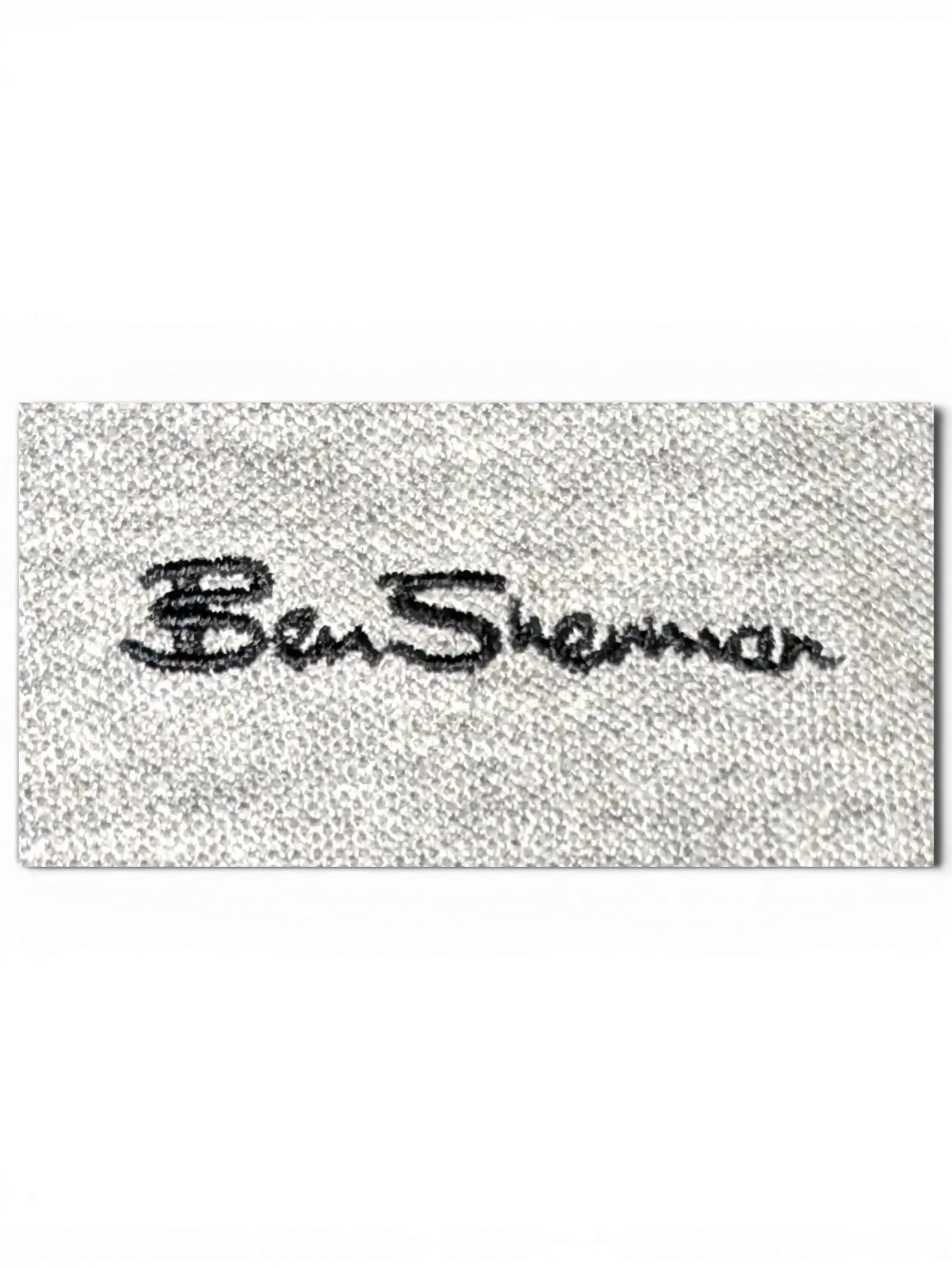 JAKE & IPI Ben Sherman grey polo shirt featuring a black embroidered chest logo and classic pique cotton texture.