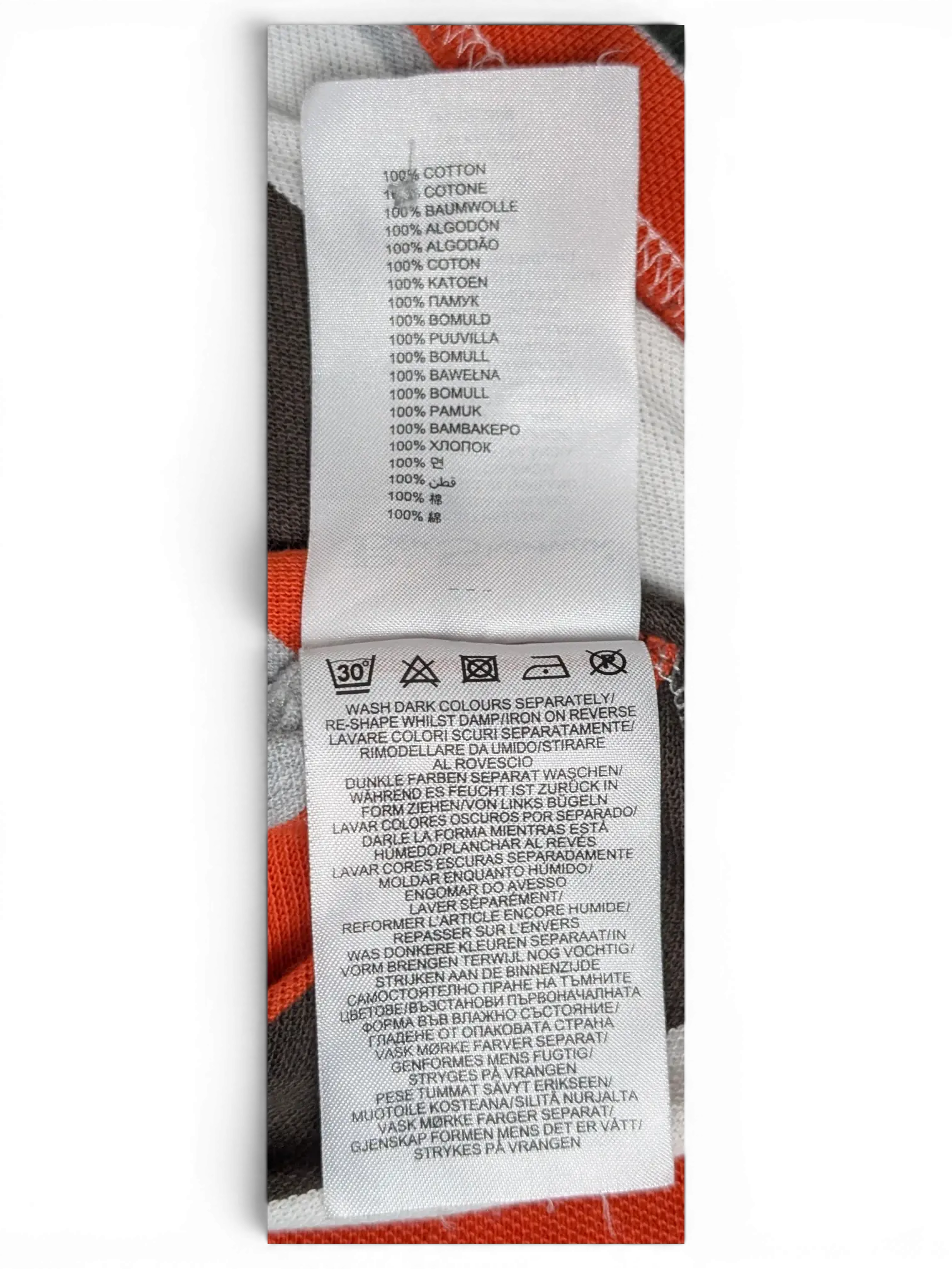 JAKE & IPI Ben Sherman polo shirt care label showing 100 percent cotton material and washing instructions