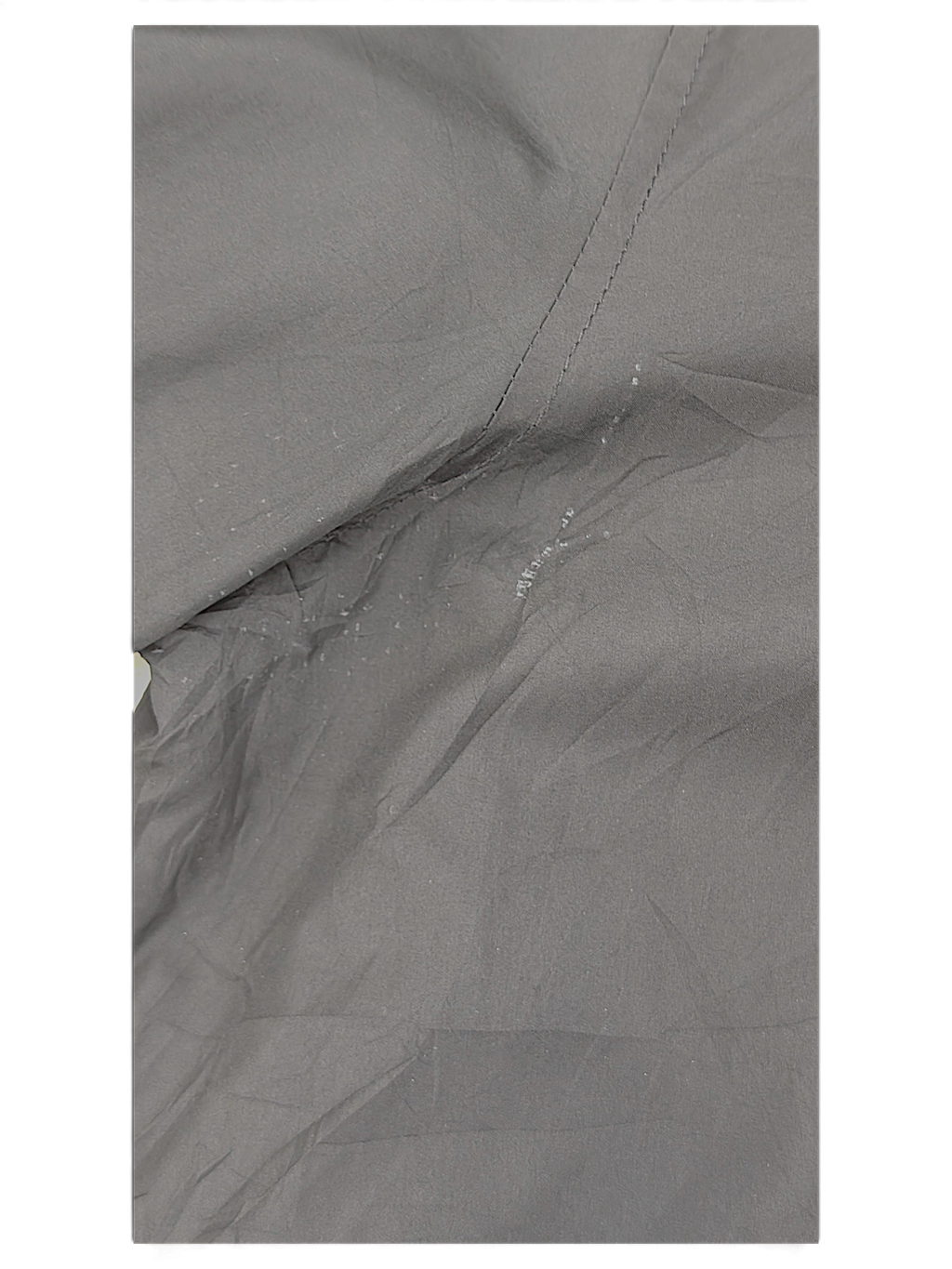 Bershka Black Zip Bomber Jacket; Underarm seam close-up showing pale marks.