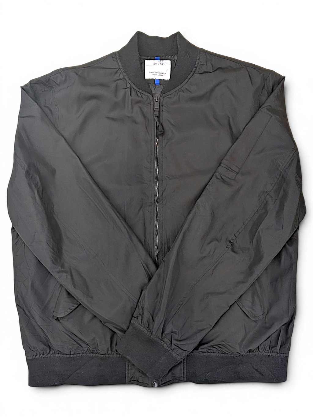 Bershka Black Zip Bomber Jacket; Front view of the black zip bomber jacket.