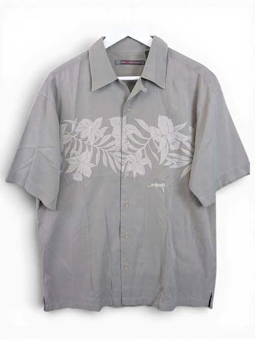 JAKE & IPI grey Billabong Hawaiian shirt with a subtle floral print and button-down front on a white hanger