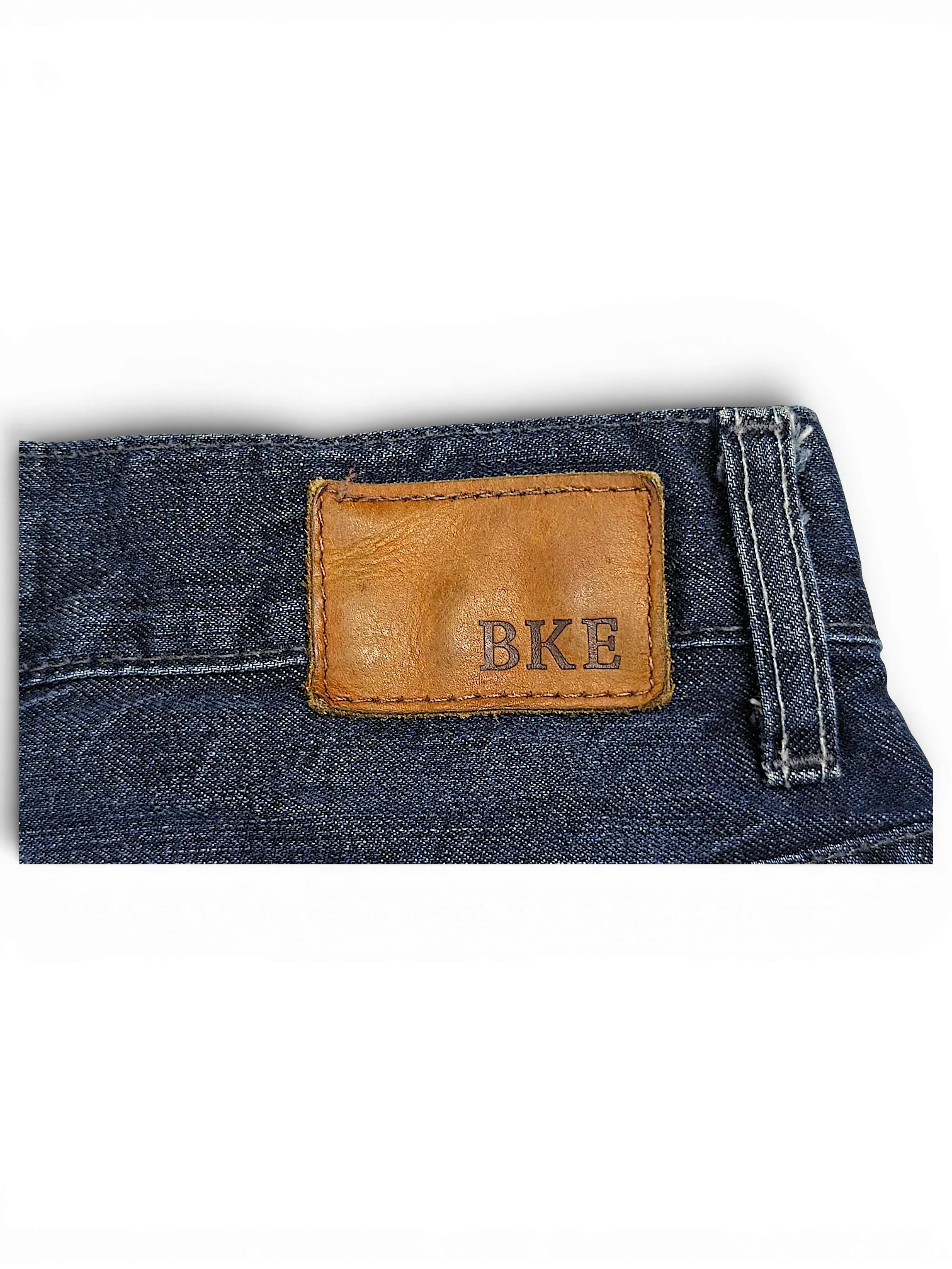 JAKE & IPI BKE Denim Carter 30L dark blue jeans featuring a brown leather brand patch on the back waistband