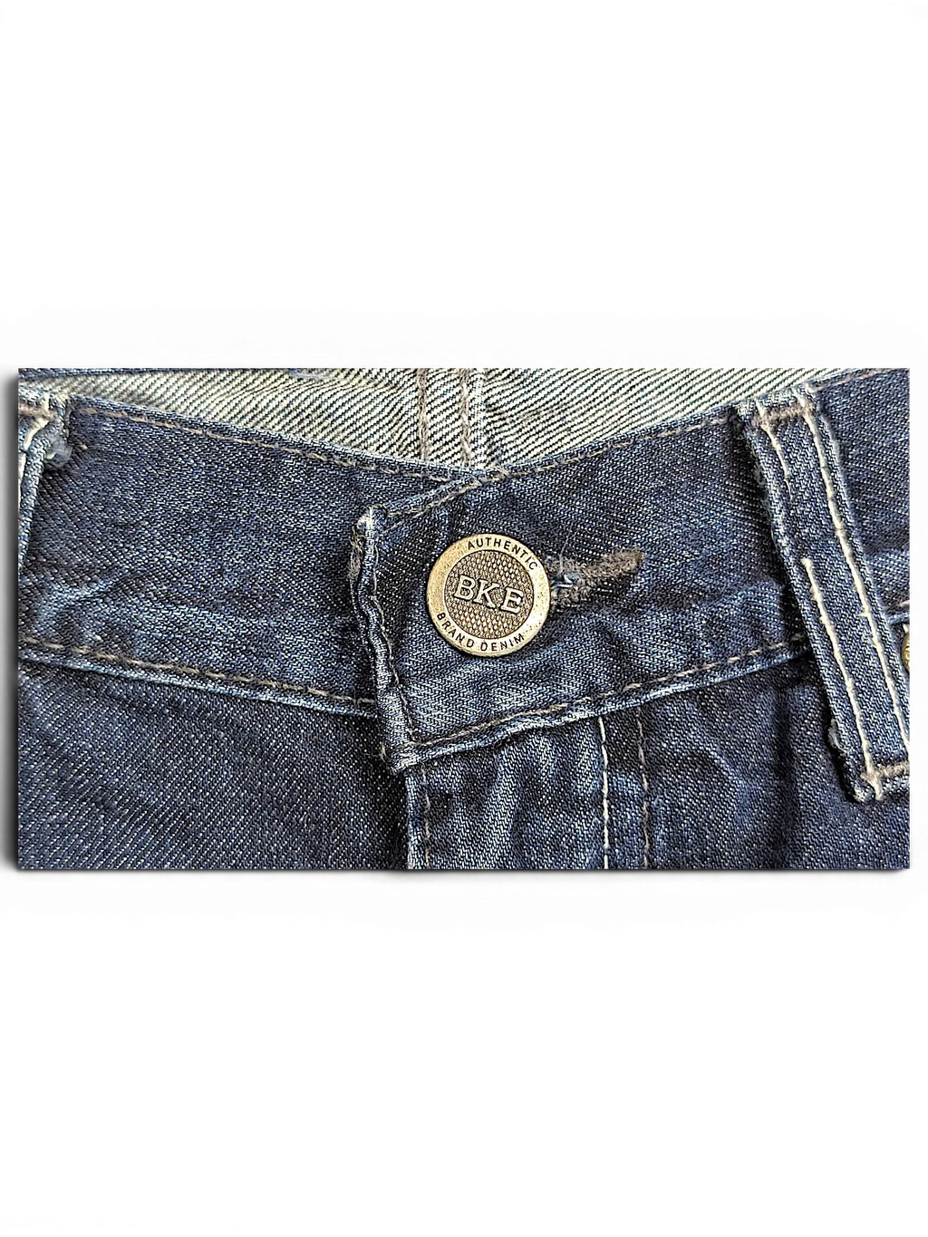 JAKE & IPI BKE Denim Carter 30L dark blue jeans featuring a branded metal button and contrast stitching