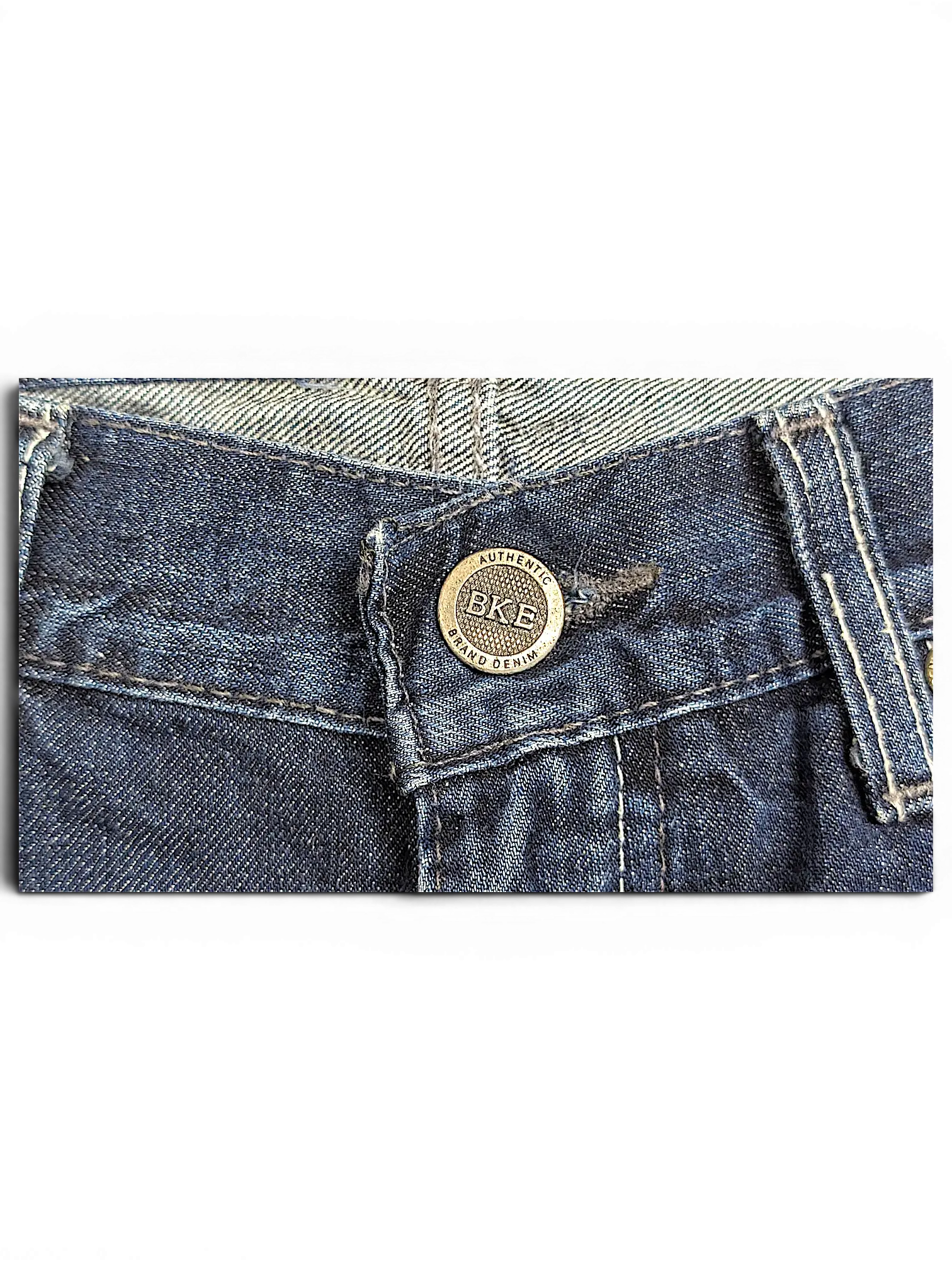 JAKE & IPI BKE Denim Carter 30L dark blue jeans featuring a branded metal button and contrast stitching