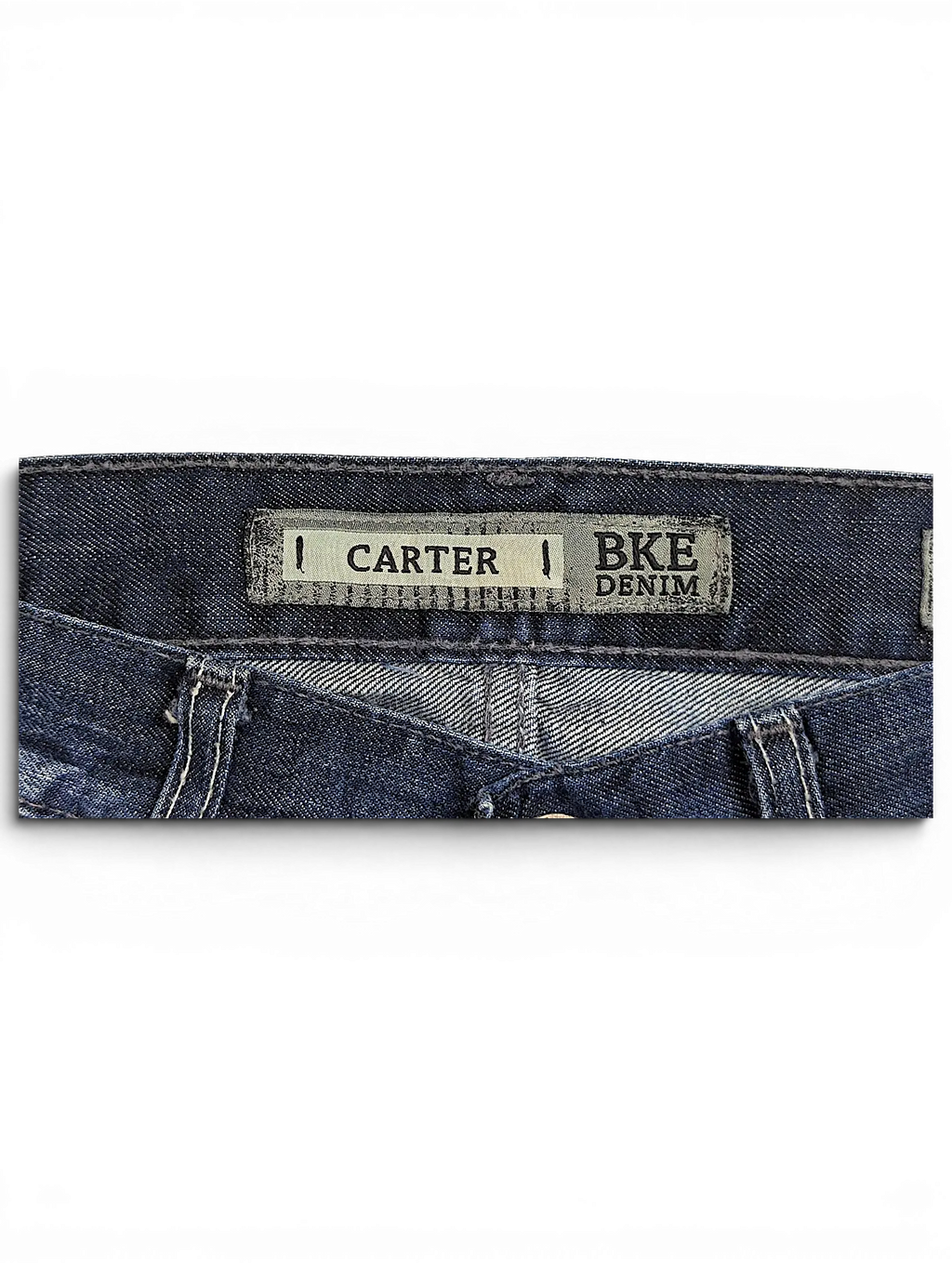 JAKE & IPI BKE Denim Carter jeans featuring a dark blue wash and branded interior waistband label
