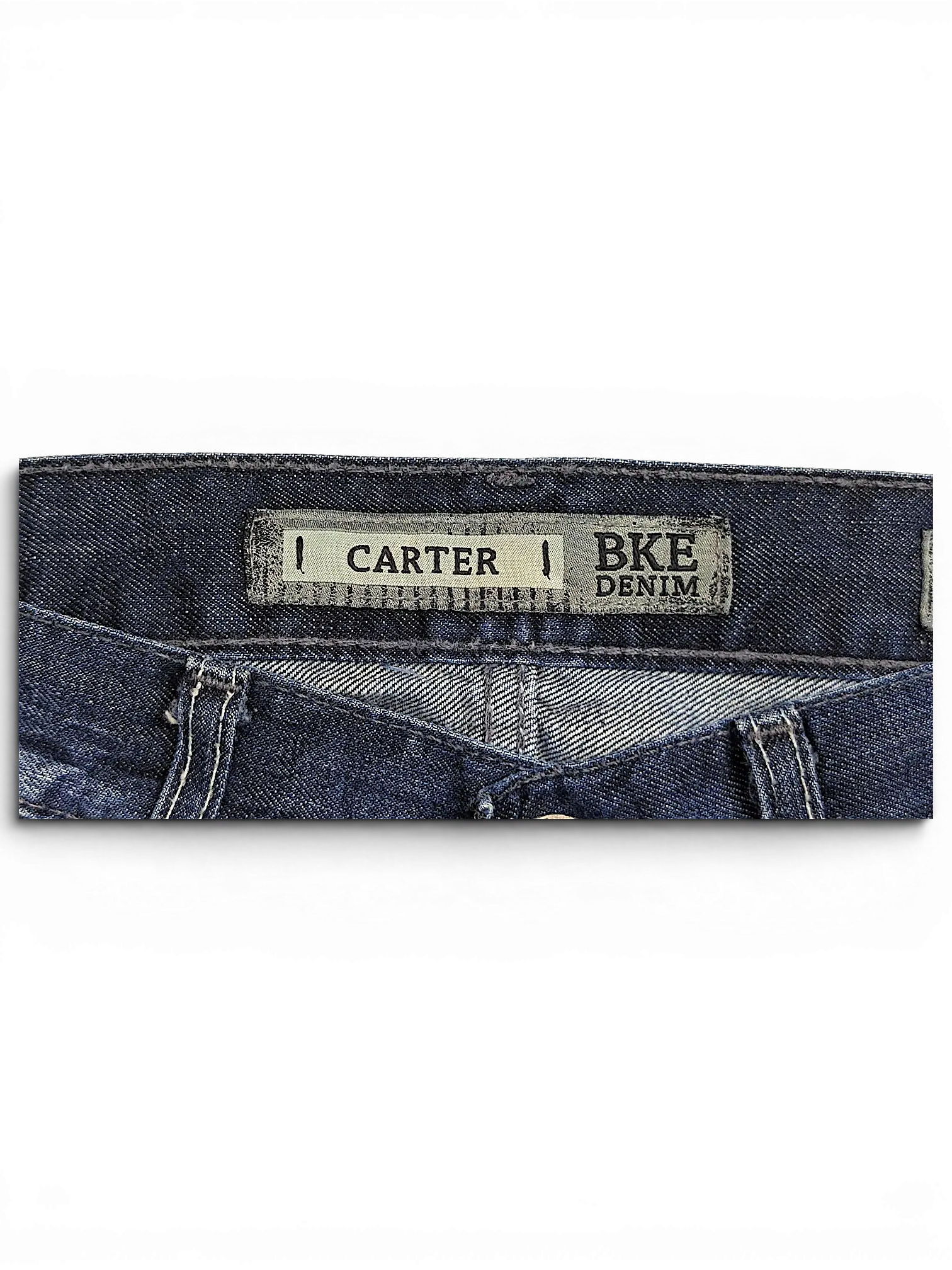 JAKE & IPI BKE Denim Carter jeans featuring a dark blue wash and branded interior waistband label