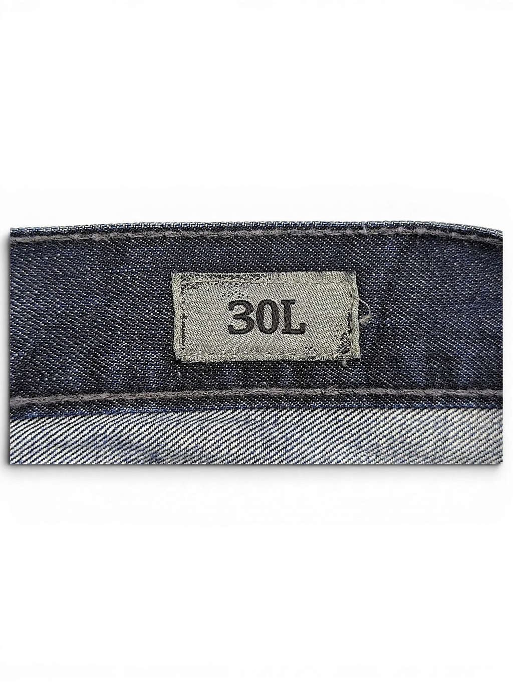 JAKE & IPI BKE Denim Carter jeans featuring a grey size tag showing 30L on the dark blue denim waistband.