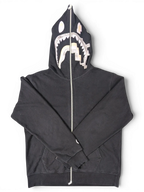 JAKE & IPI black Bape Shark hoodie with full-zip closure and iconic metallic shark graphic on the hood