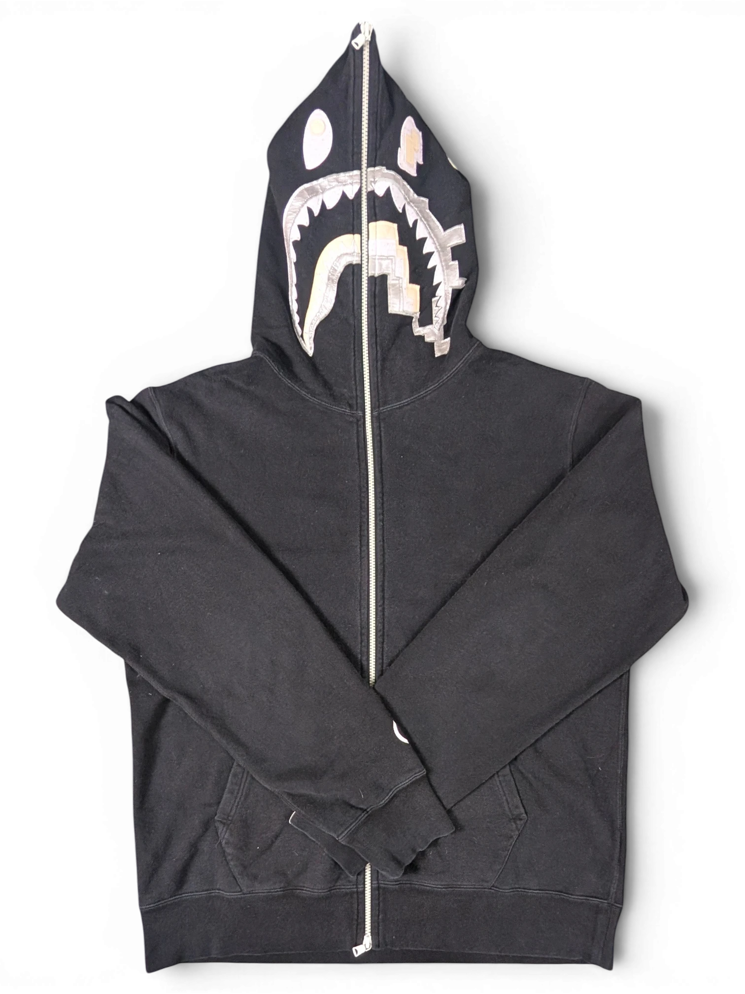 JAKE & IPI black Bape Shark hoodie with full-zip closure and iconic metallic shark graphic on the hood