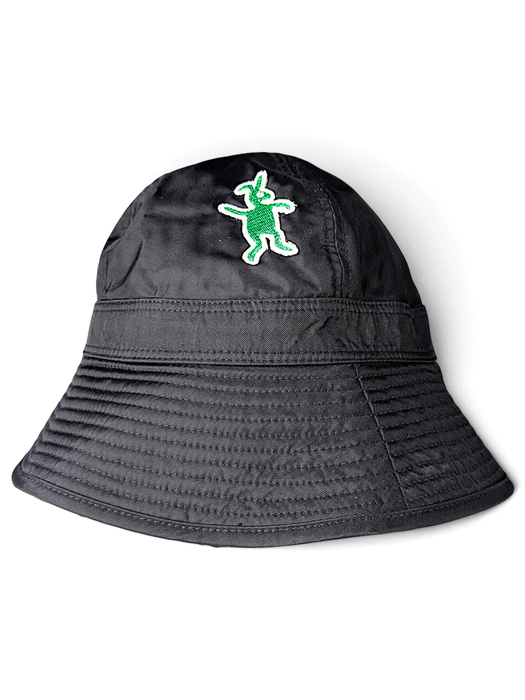 JAKE & IPI black bucket hat featuring a green embroidered character patch on the front crown.