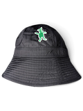JAKE & IPI black bucket hat featuring a green embroidered character patch on the front crown.