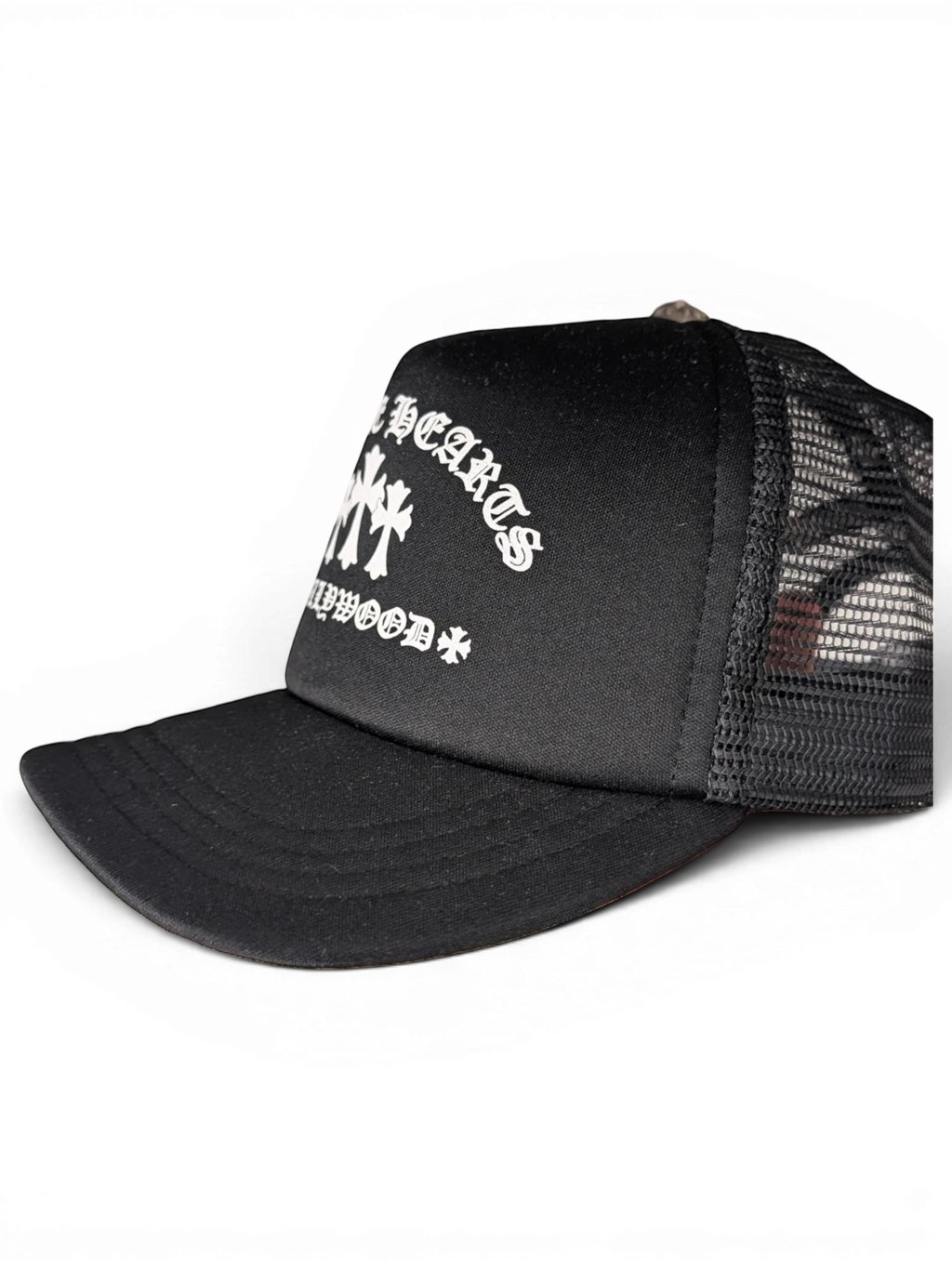 JAKE & IPI black Chrome Hearts trucker hat with white gothic lettering and cross embroidery on the front panel