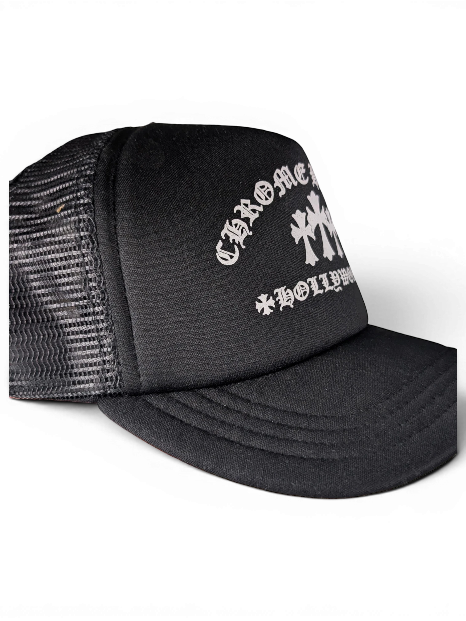 JAKE & IPI black Chrome Hearts trucker hat with white Hollywood cross embroidery and mesh back panel