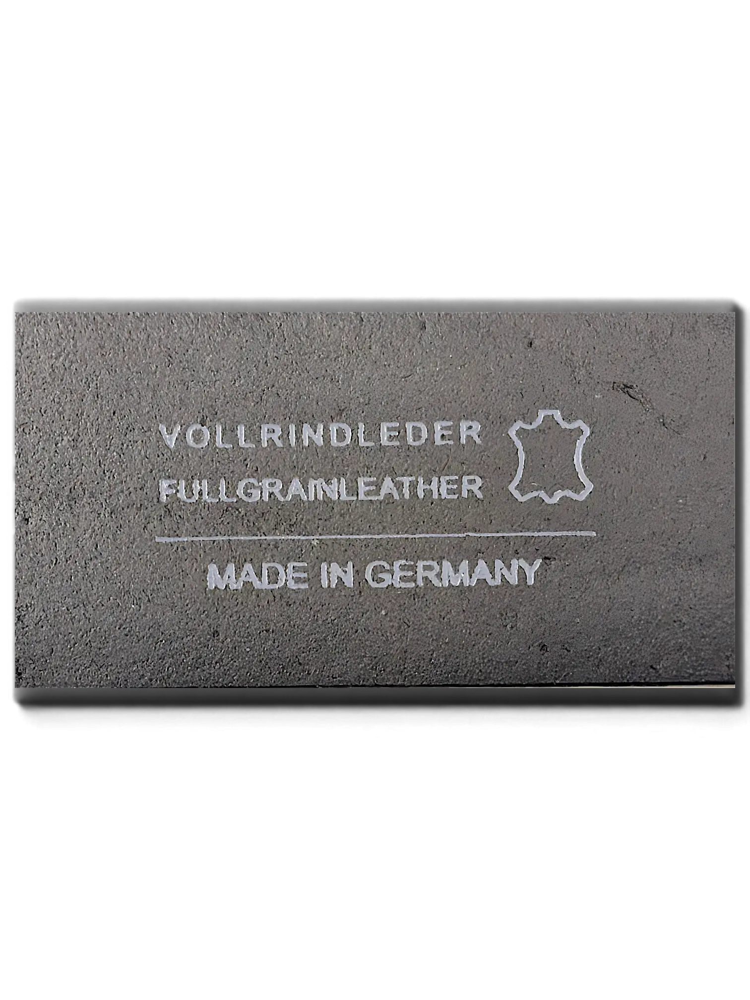 JAKE & IPI LLOYD black full-grain leather belt detail showing Made in Germany stamp