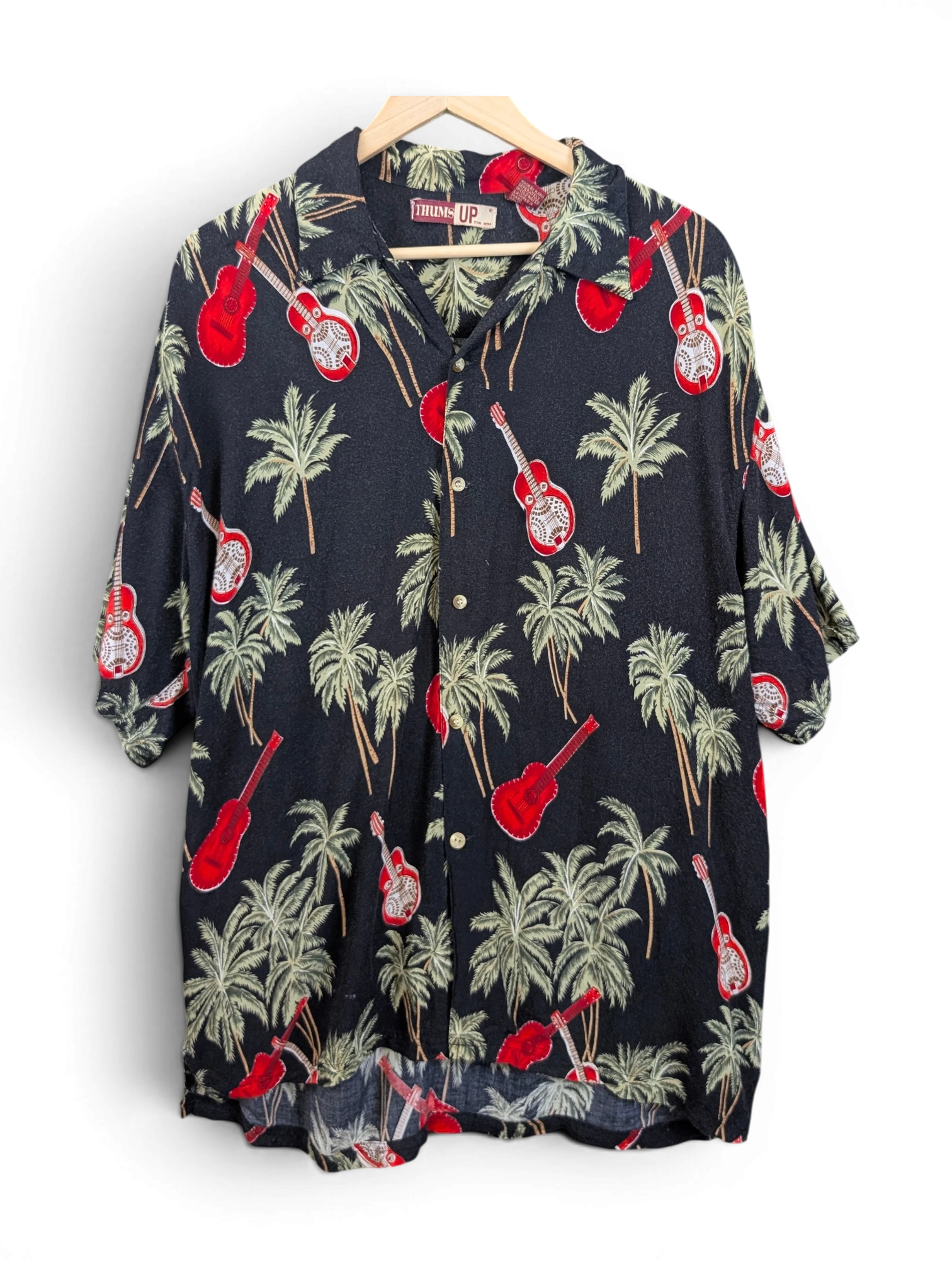 JAKE & IPI black Hawaiian shirt featuring a tropical palm tree and red guitar print with a classic collar