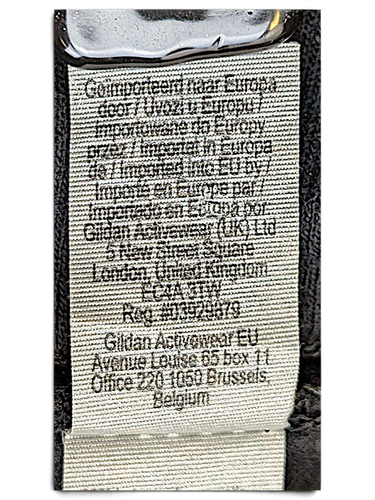 JAKE & IPI black hoodie garment care label with Gildan manufacturing details and fabric composition