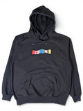 JAKE & IPI black hoodie featuring a colorful IBE Personal Nonsense graphic on the chest with a front kangaroo pocket.