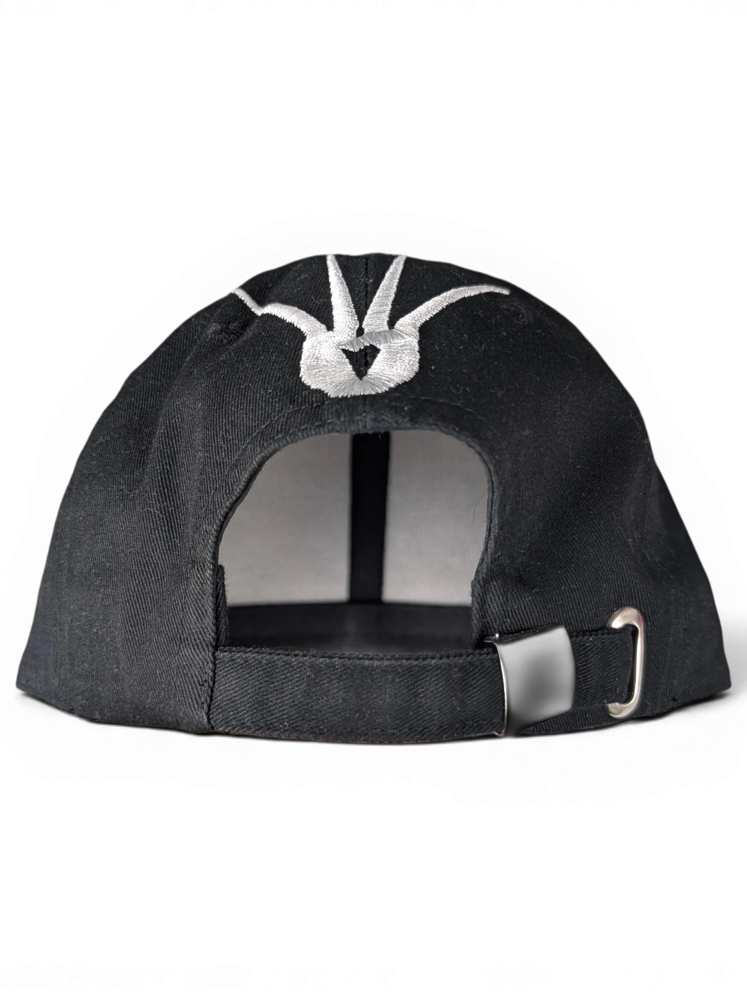 JAKE & IPI black IBE Vain cap with white embroidered logo detail on the back and adjustable metal strap closure