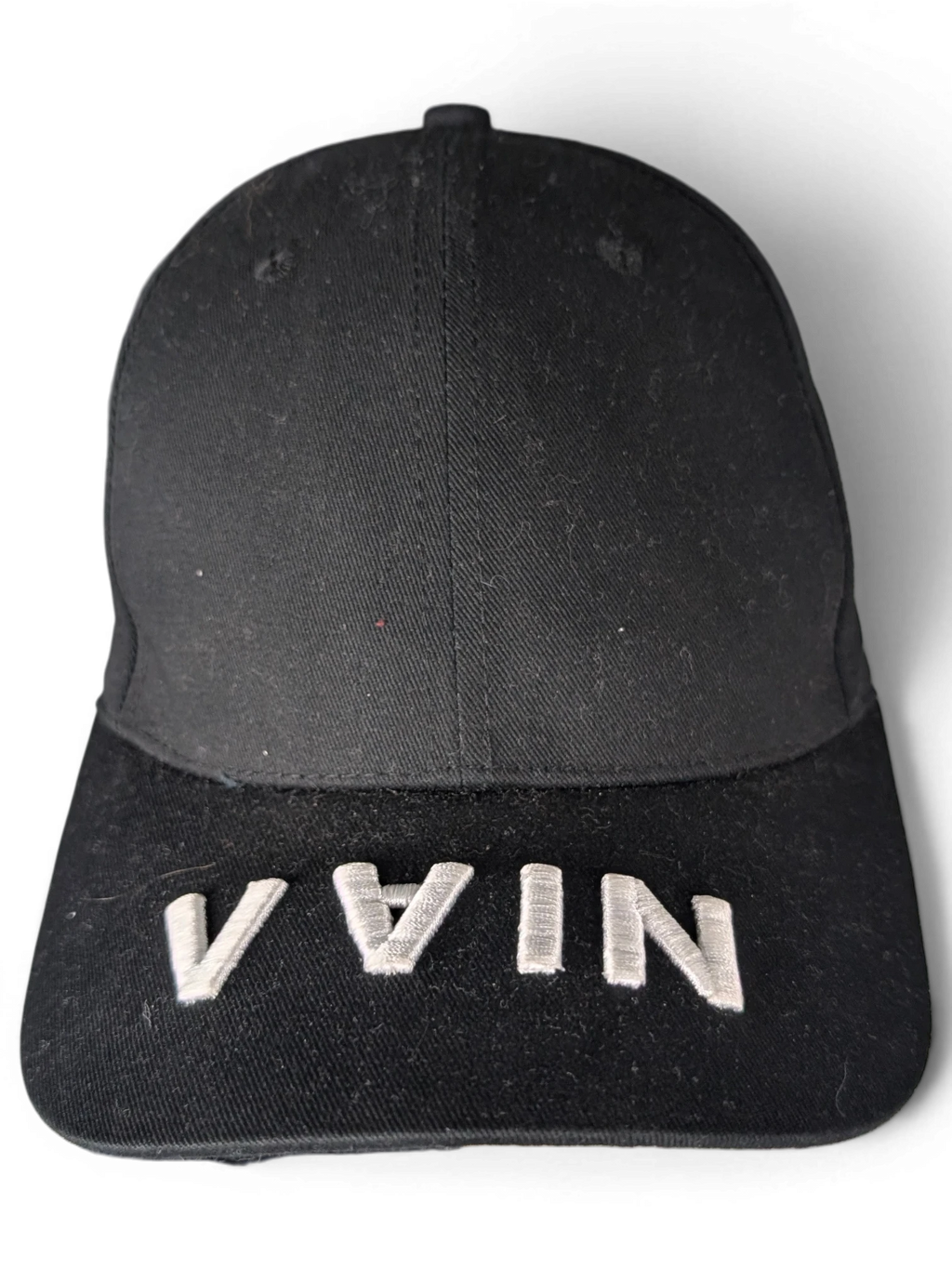 JAKE & IPI black IBE Vain cap with white embroidered text on the brim