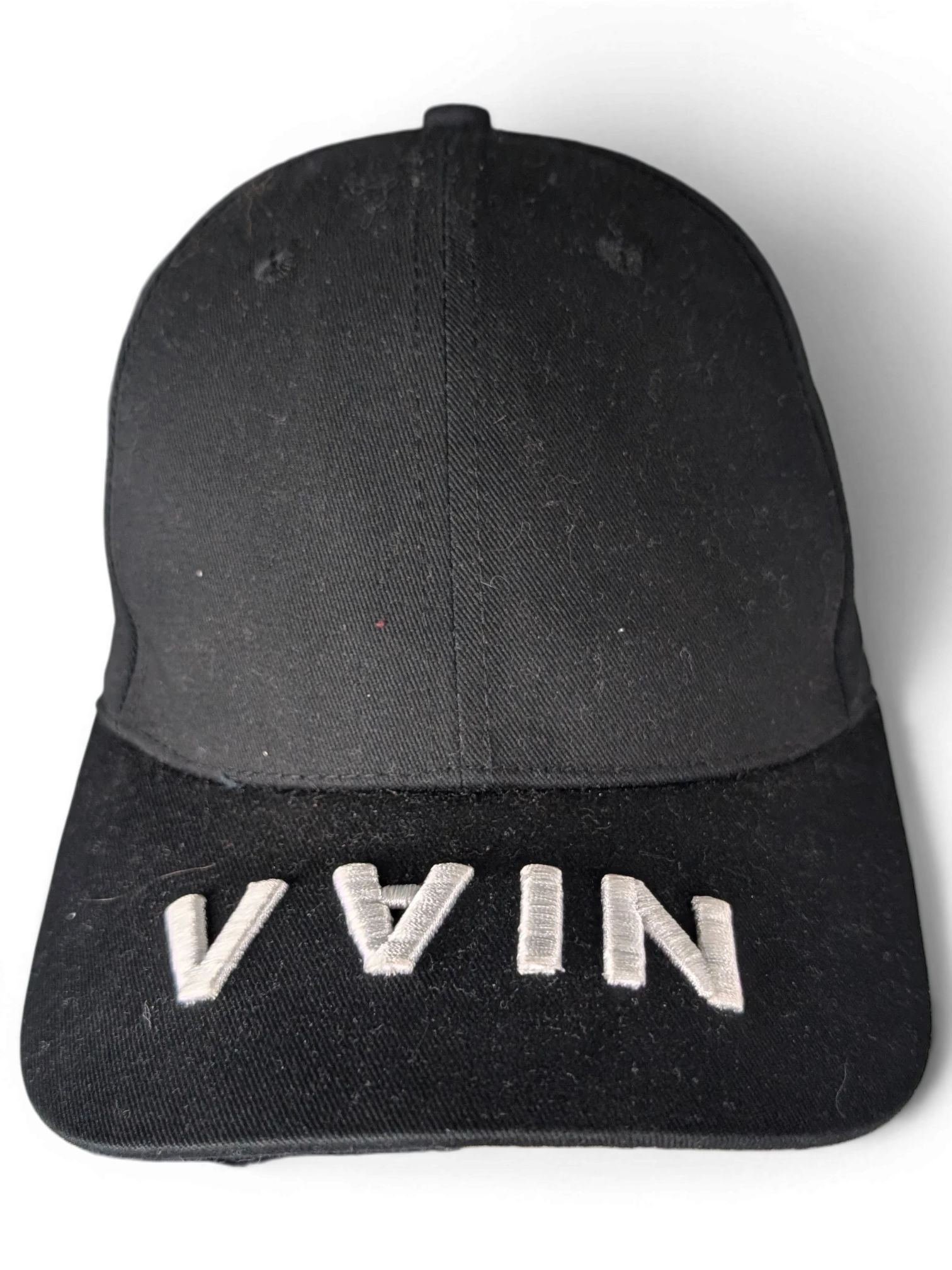 JAKE & IPI black IBE Vain cap with white embroidered text on the brim