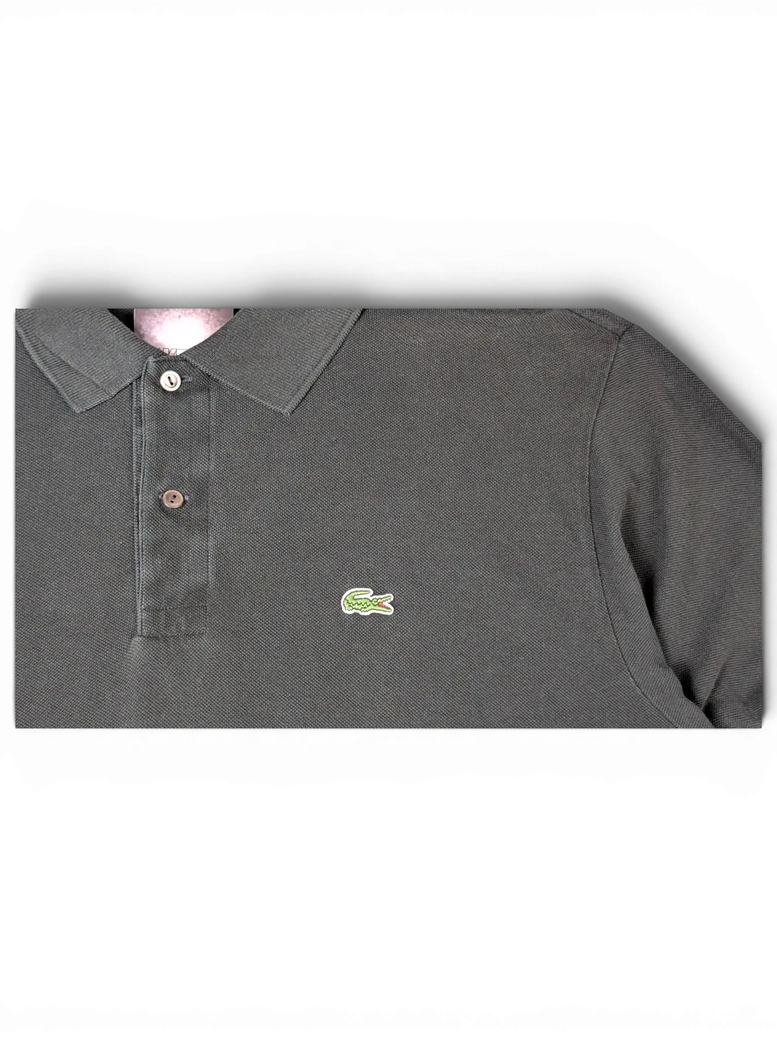 JAKE & IPI black Lacoste polo shirt featuring a classic collar, two-button placket, and signature crocodile logo.