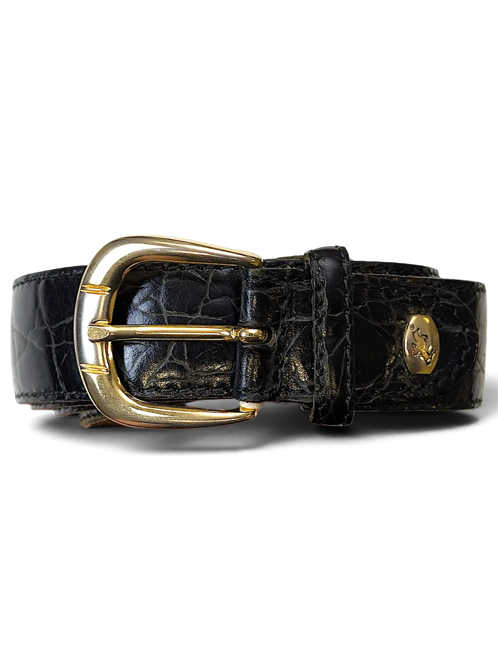JAKE & IPI black leather belt featuring a textured animal print pattern and a polished golden buckle.