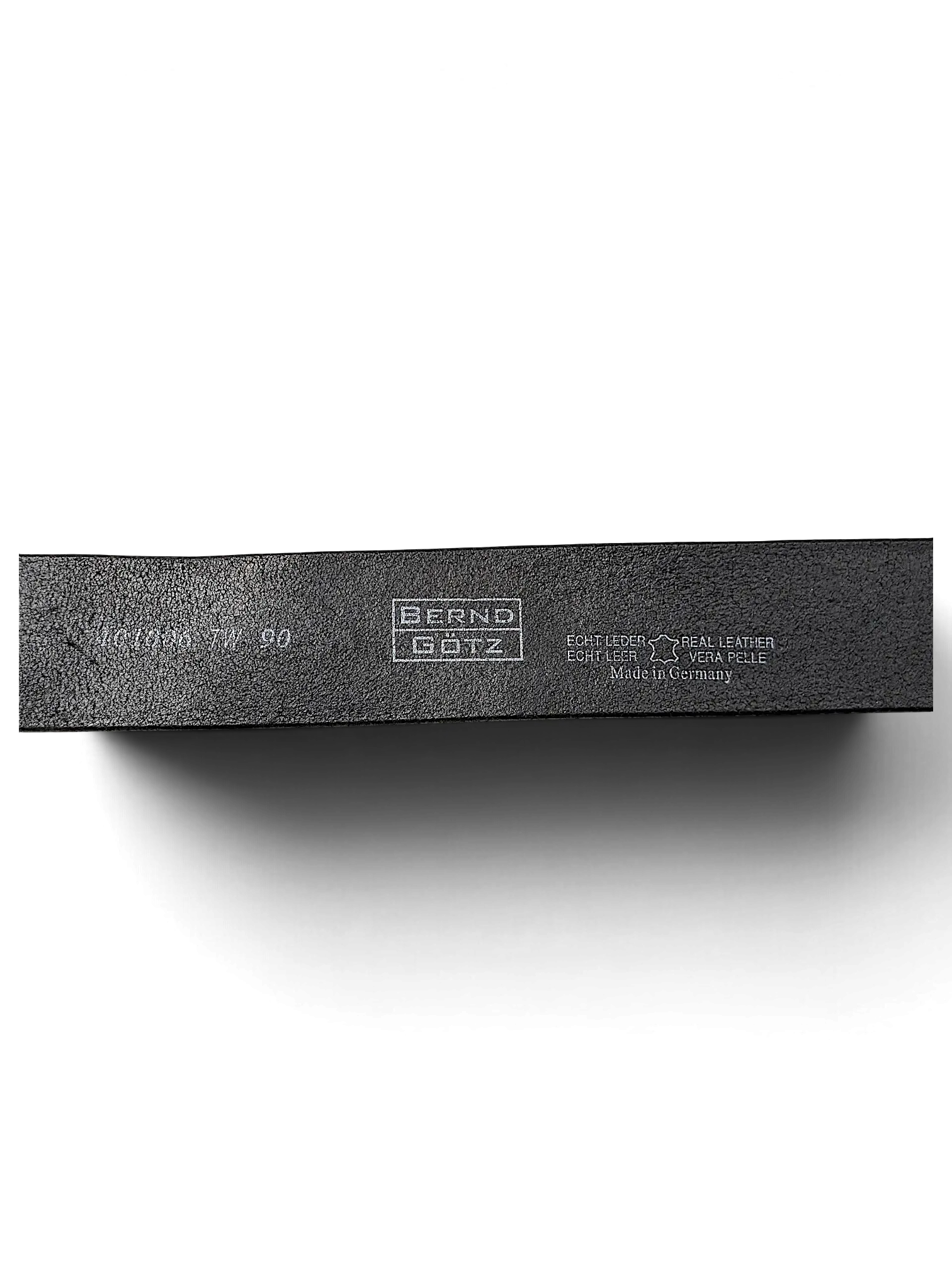 JAKE & IPI black leather belt interior showing Bernd Götz branding and Made in Germany stamp