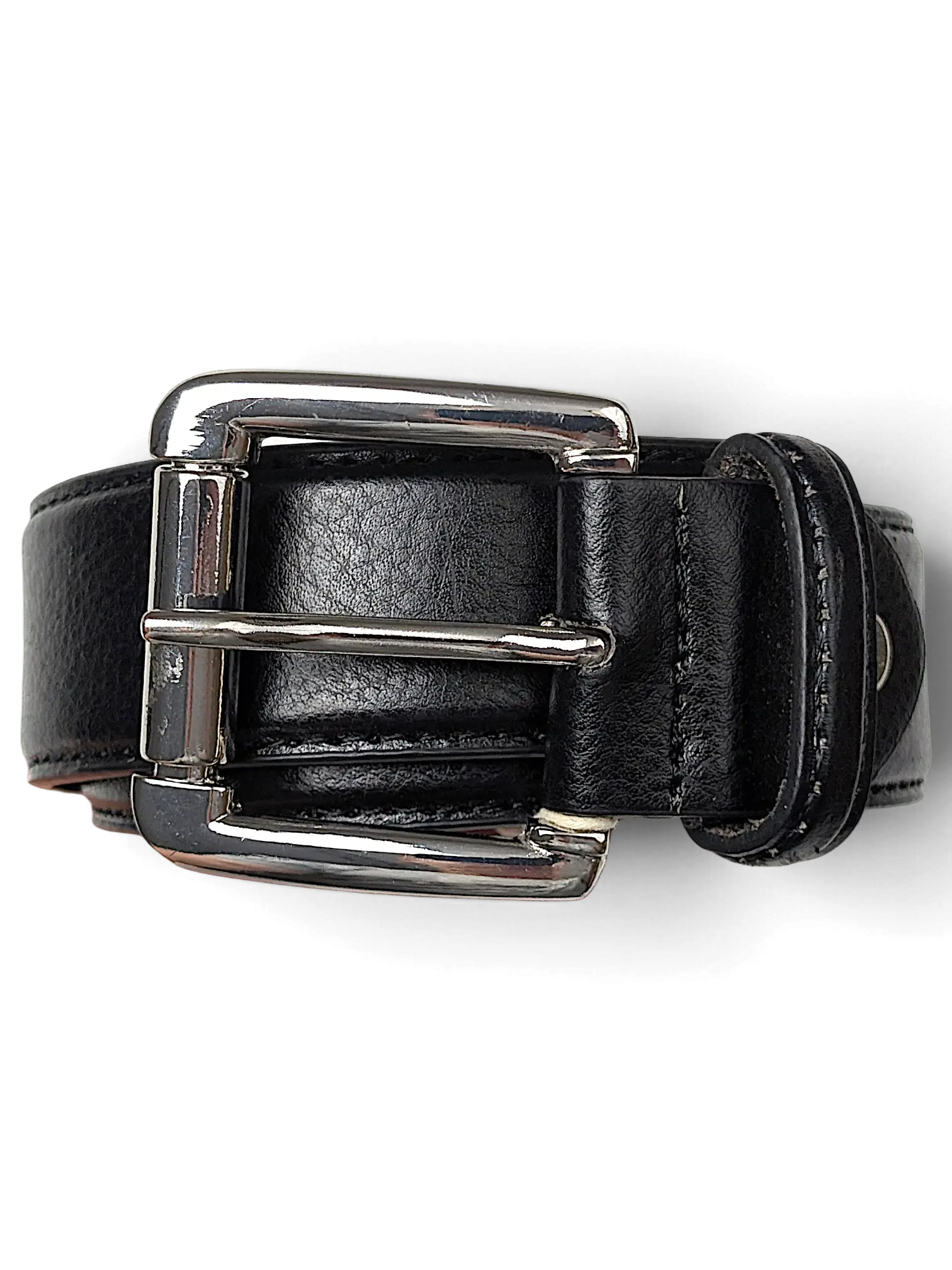 JAKE & IPI Luigi Lamberto black leather belt with a polished silver-tone metal buckle held in a hand