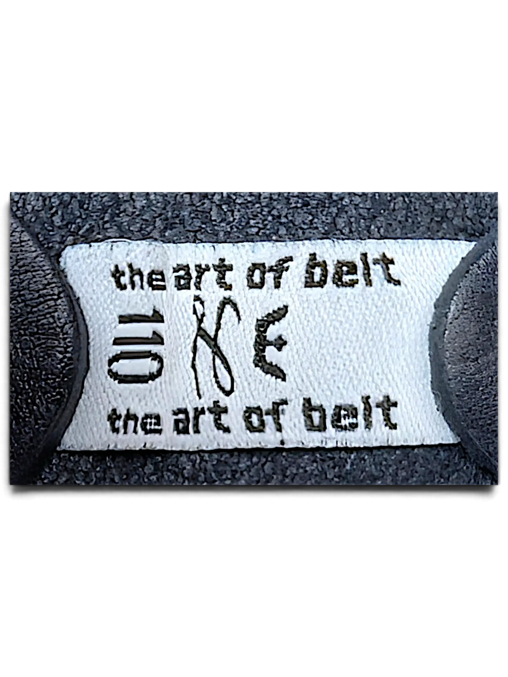 JAKE & IPI The Art Of Belt black leather belt interior label with size 110 and copper rivet detail