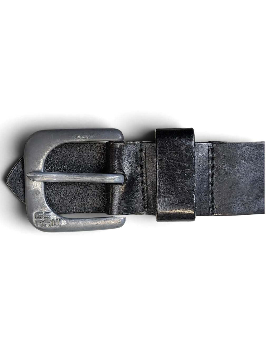 JAKE & IPI G.S. Raw black leather belt featuring a distressed metal buckle with engraved branding