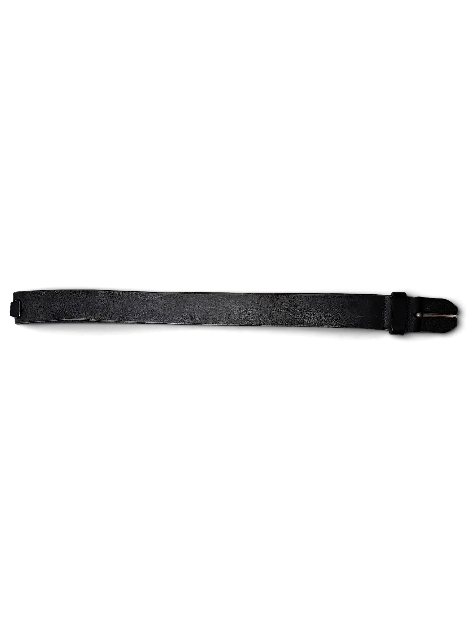 JAKE & IPI black leather belt with a metal buckle and attached brand tag against a black background