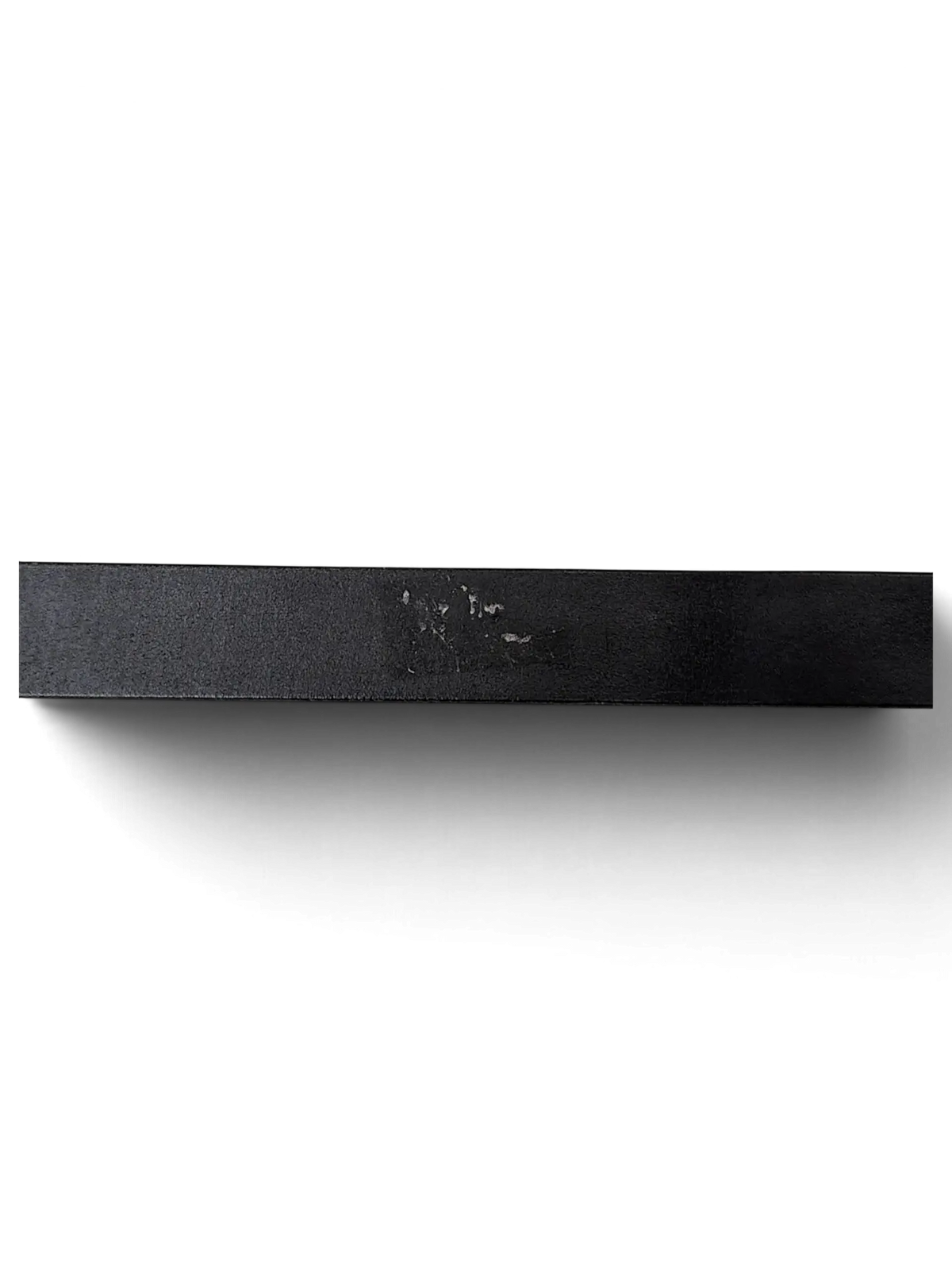 JAKE & IPI black leather belt strap featuring a smooth finish and minimalist design