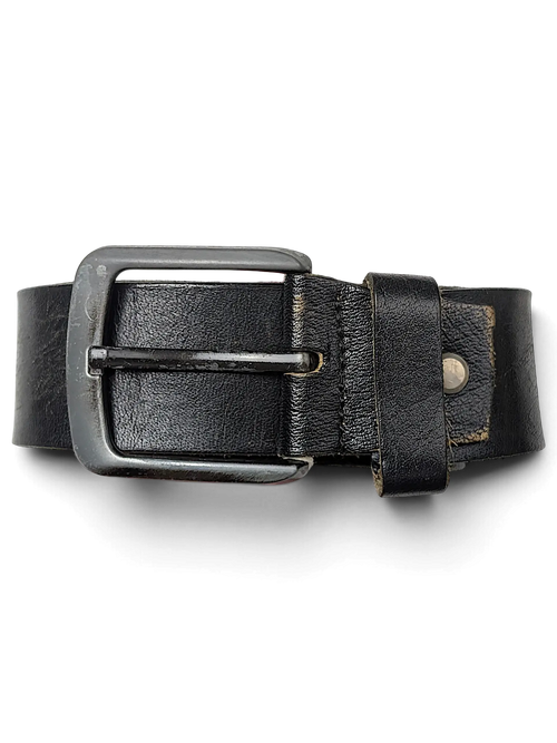 JAKE & IPI black leather belt with a silver metal buckle held by a hand against a black background