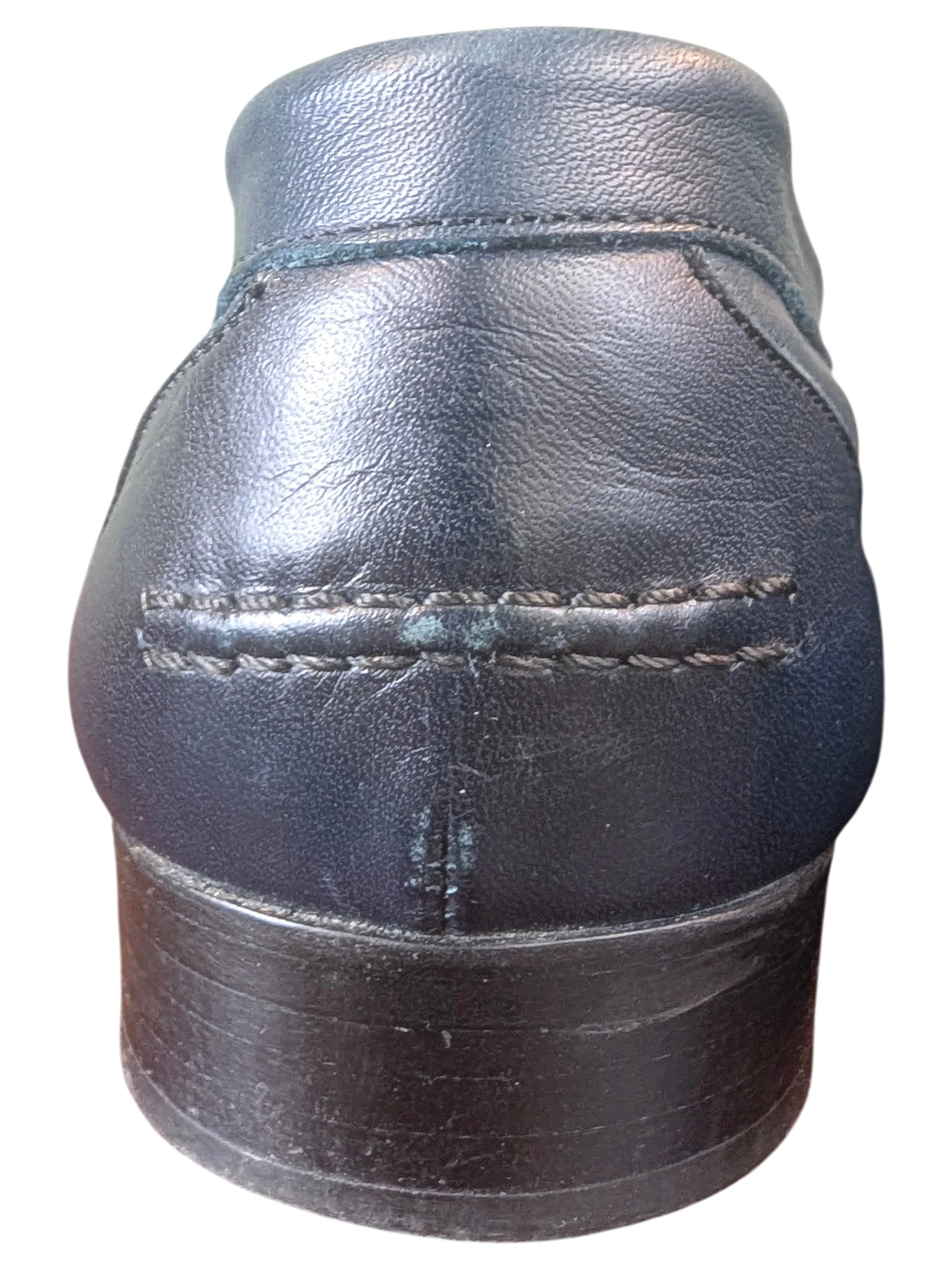 Rear view of JAKE & IPI black leather loafers featuring detailed stitching on the heel counter.