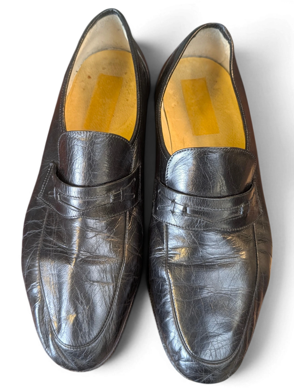 JAKE & IPI black leather penny loafers with a classic slip-on design and textured finish