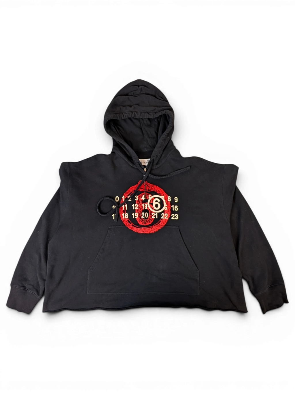 JAKE & IPI black MM6 Lunar New Year hoodie with a red circular graphic and numeric logo on the front
